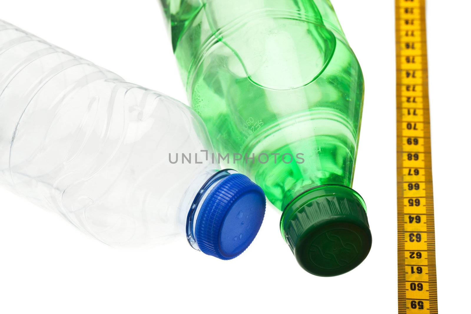 Image of bottles and measuring tape isolated on white background