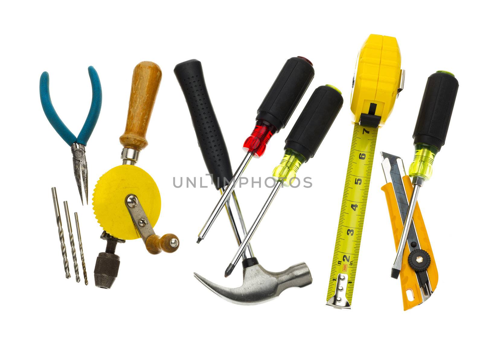 Many different hand tools placed on a white background