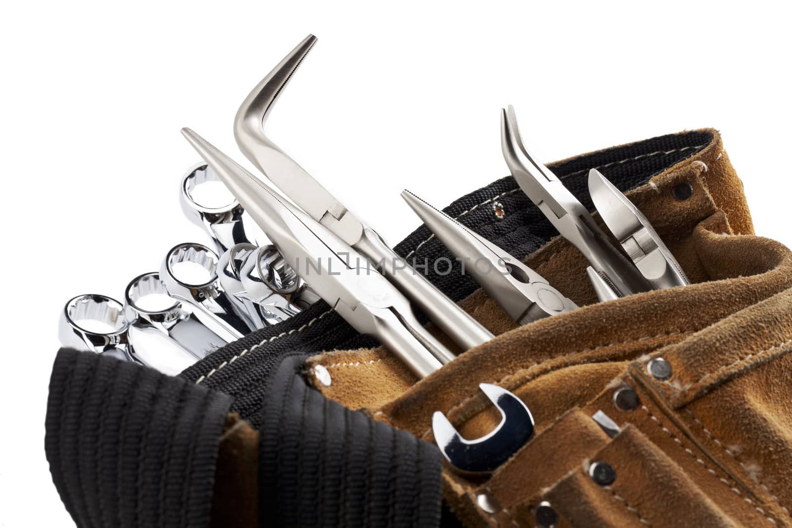 A close-up cropped image of workers belt with construction tools isolated on white 