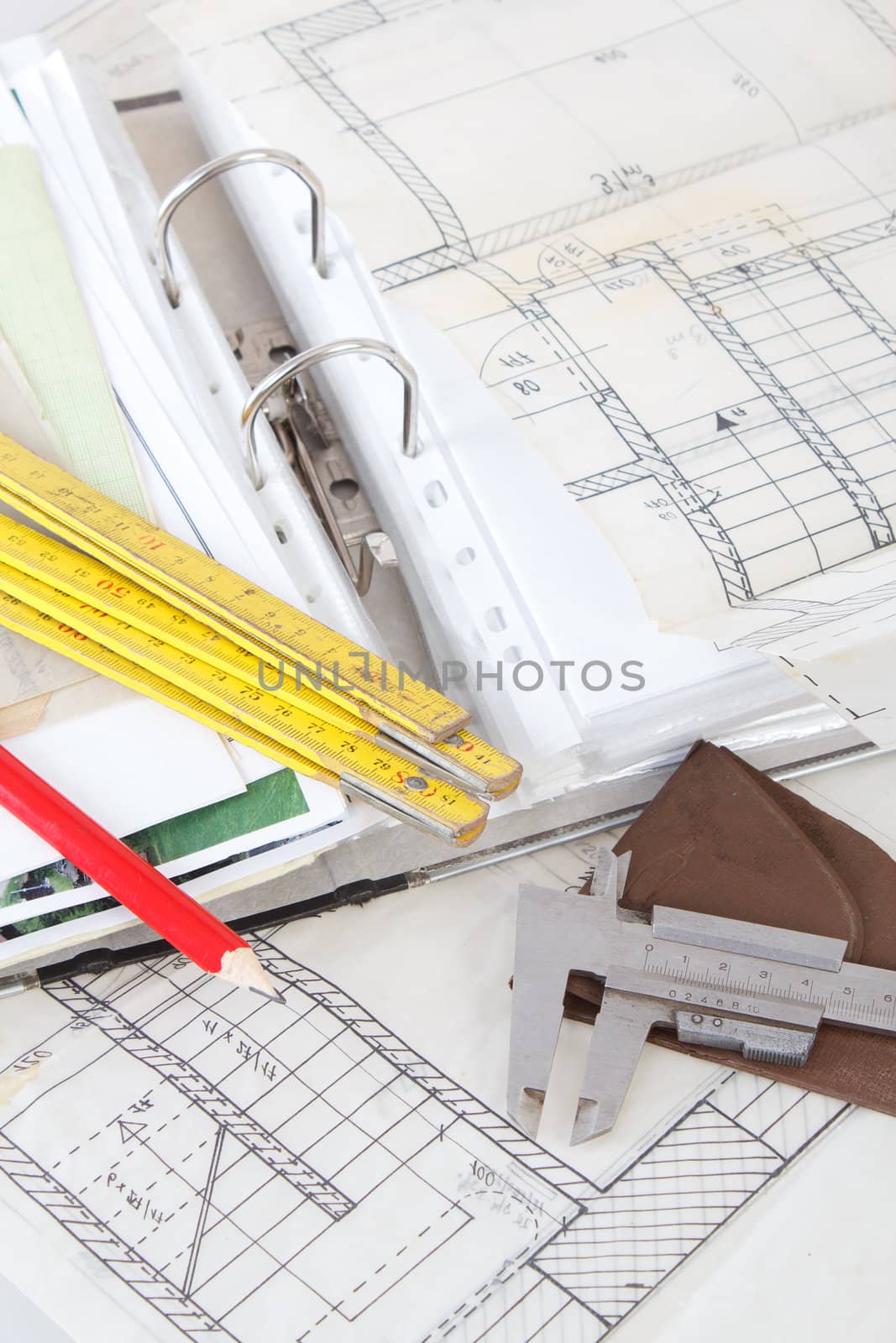 Architectural plans of the old paper tracing paper measuring tools and file with the project