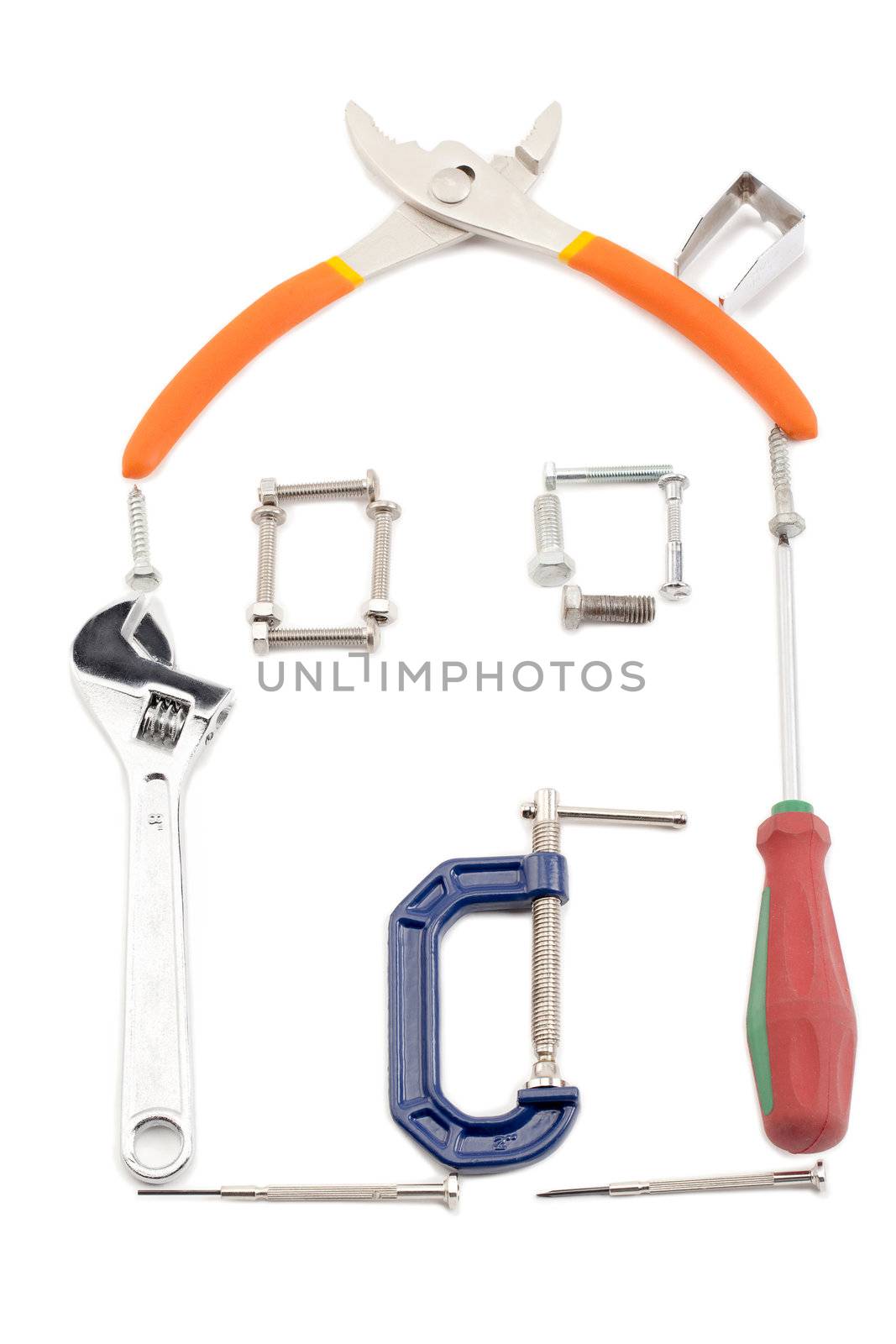 Image of tools forming an image of an house isolated on white background