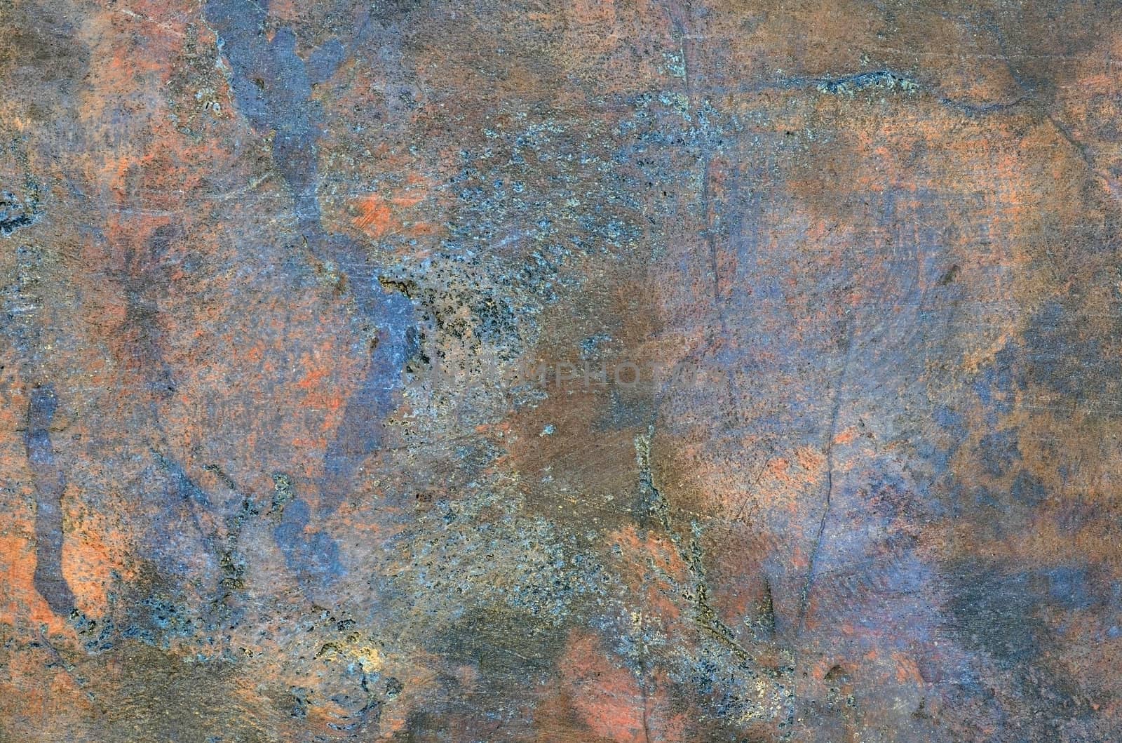 Bronze and copper mixed plate surface. Visible oxidation.