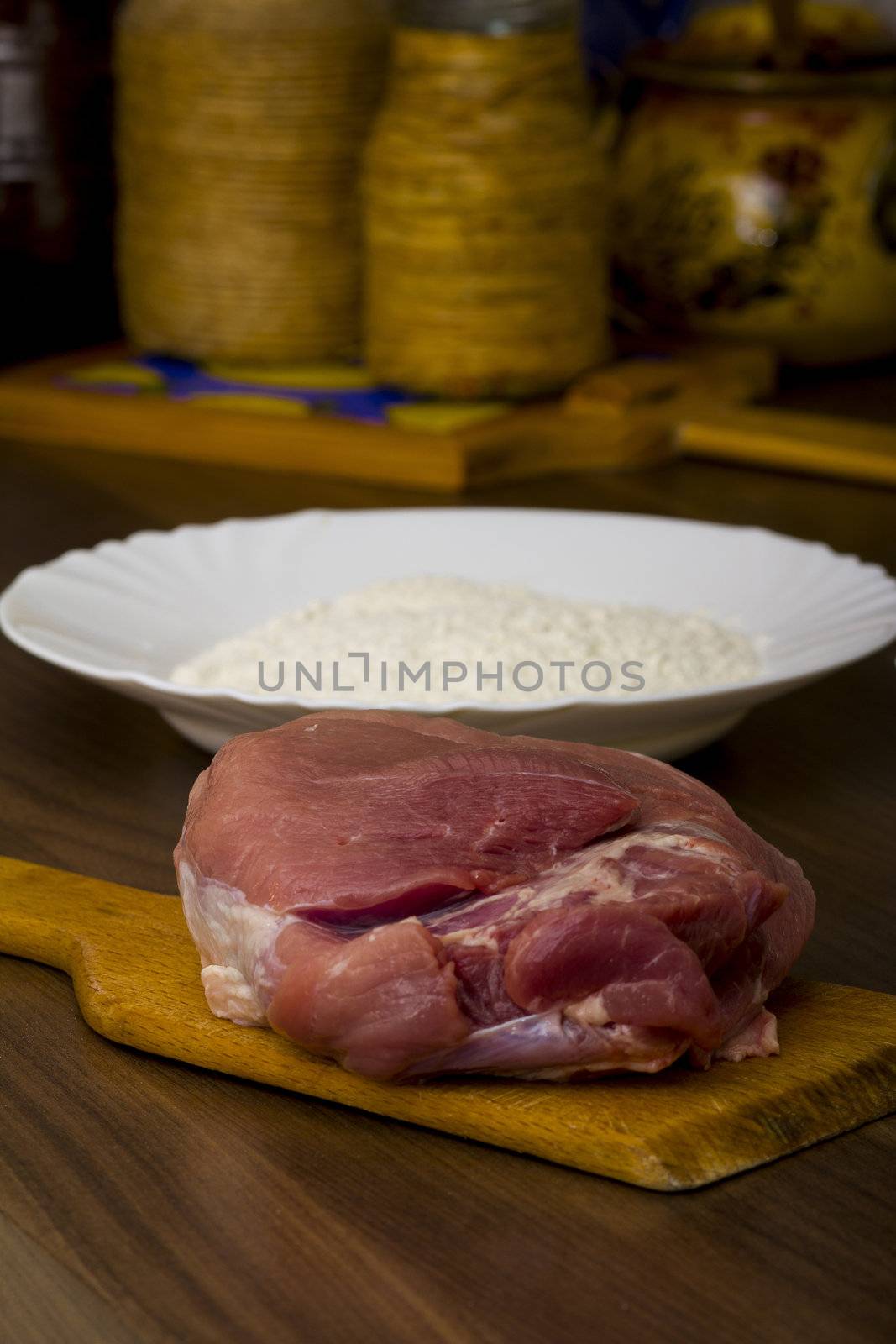 preparations for cooking schnitzel in the kitchen