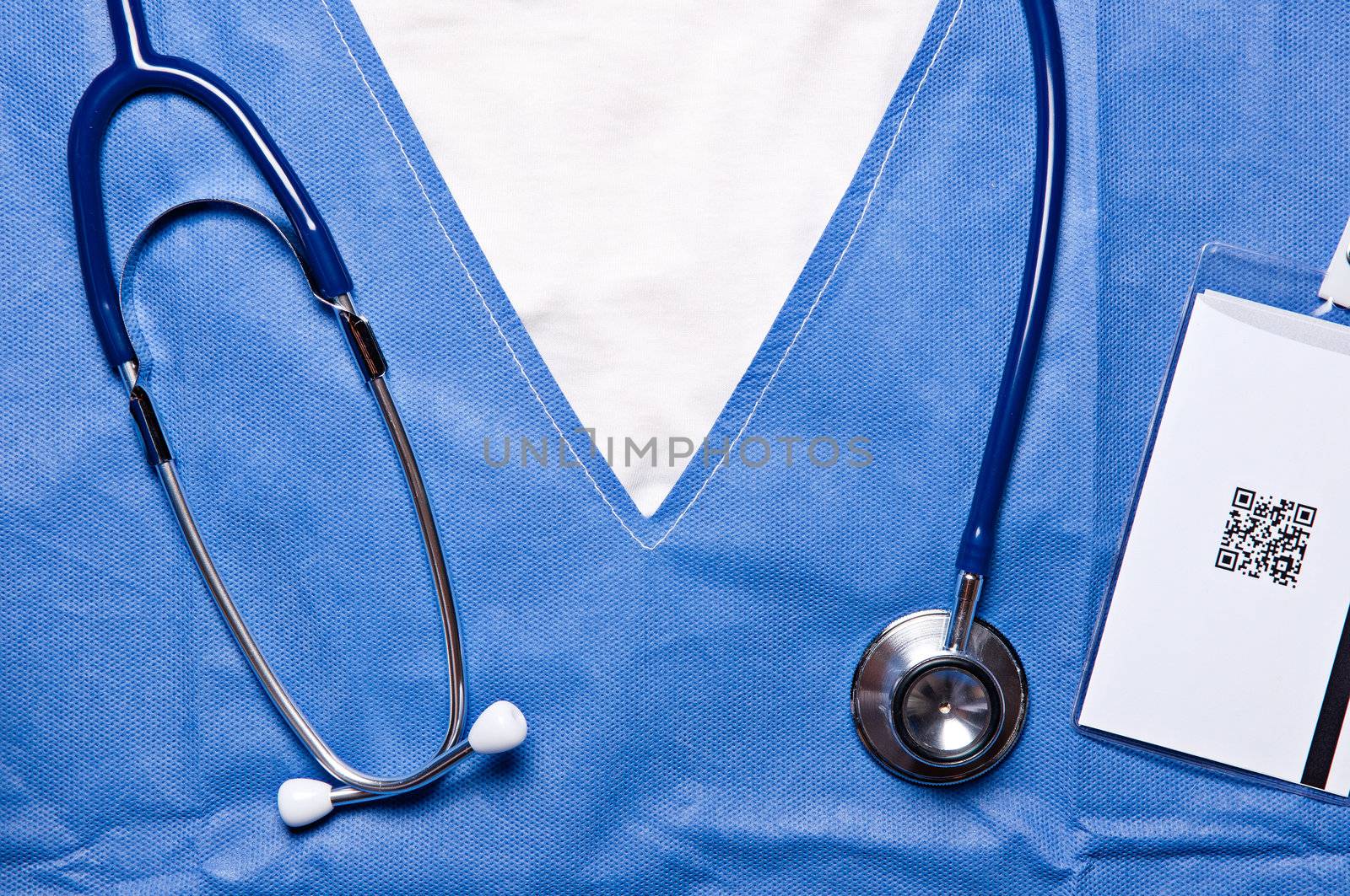 Closeup photo of a doctor chest, wearing a stethoscope around the neck and an ID card