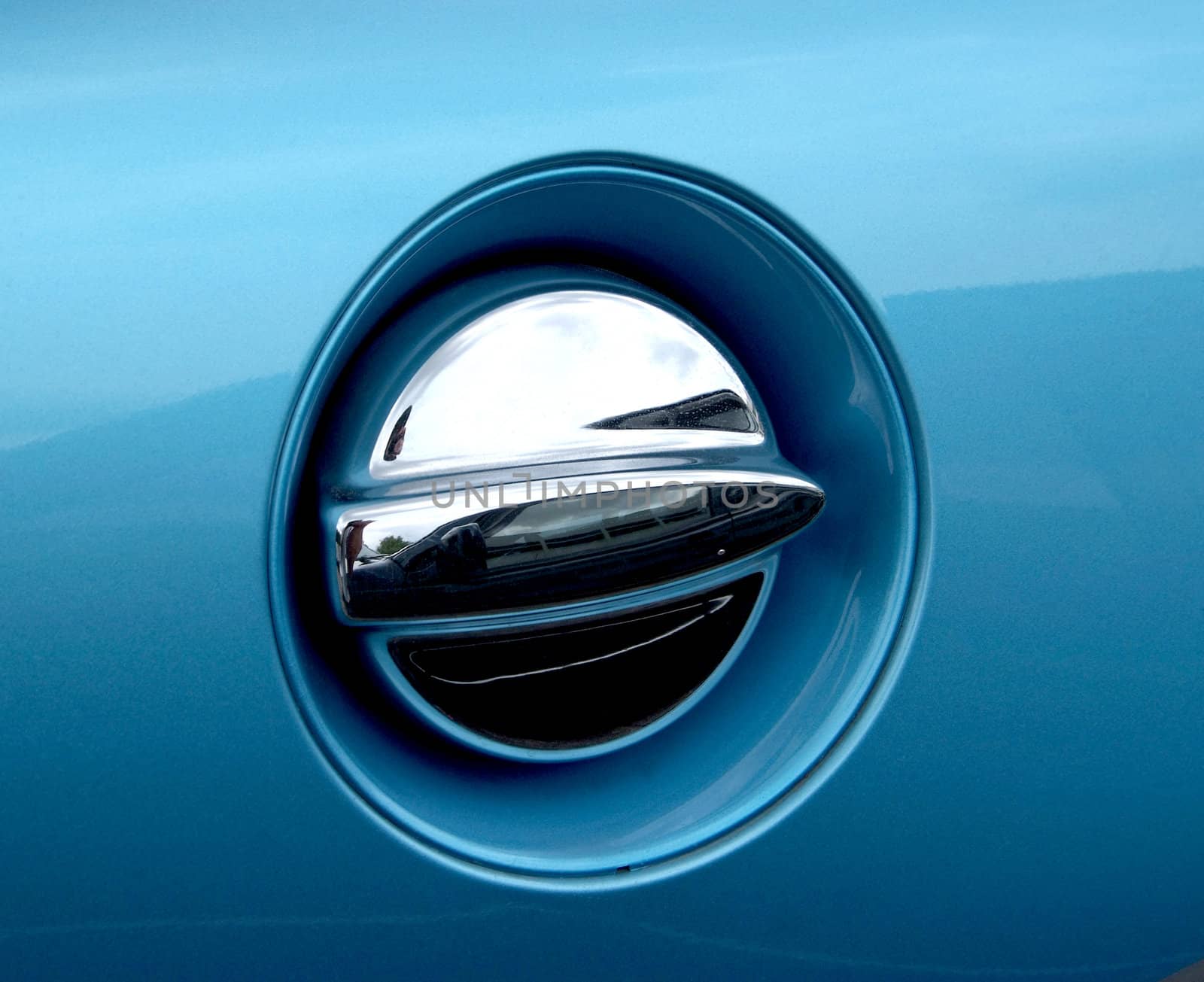 Fuel cap on new blue car.