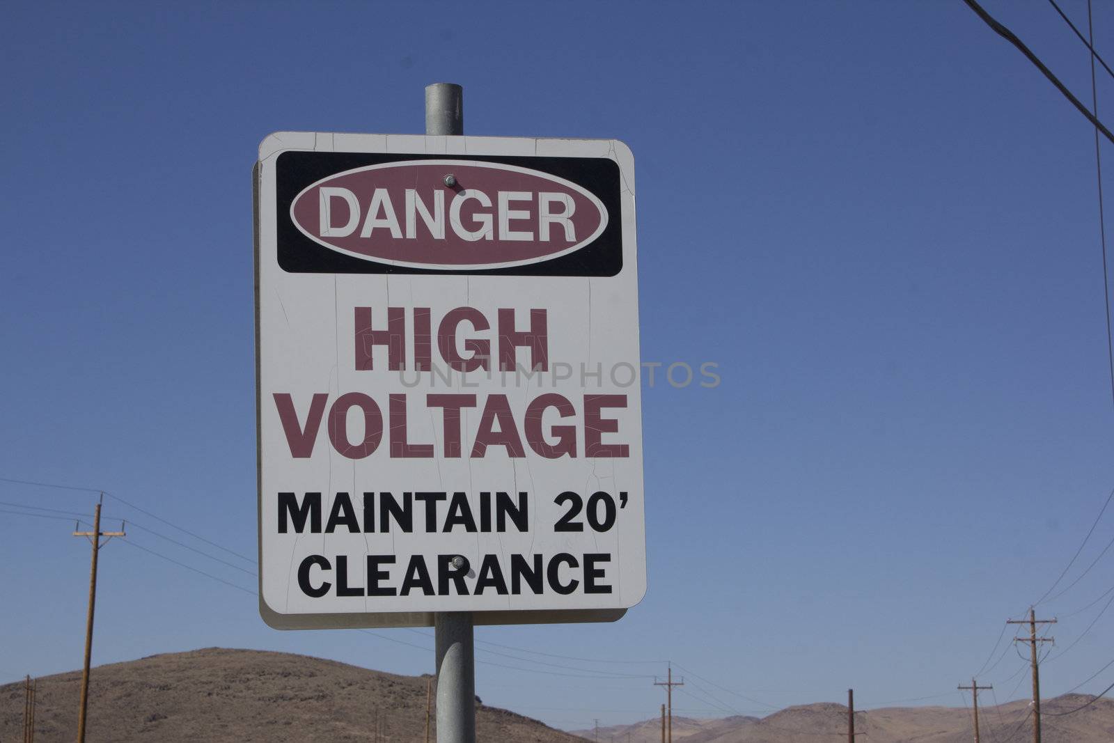 danger high voltage maintain 20' clearance