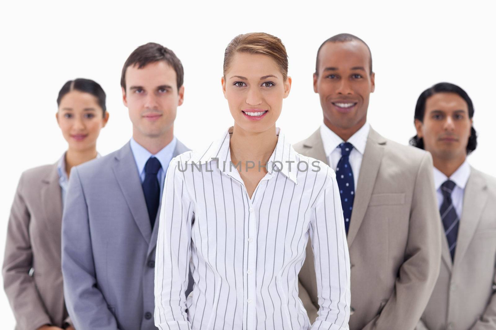 Close-up of a business team a smiling by Wavebreakmedia