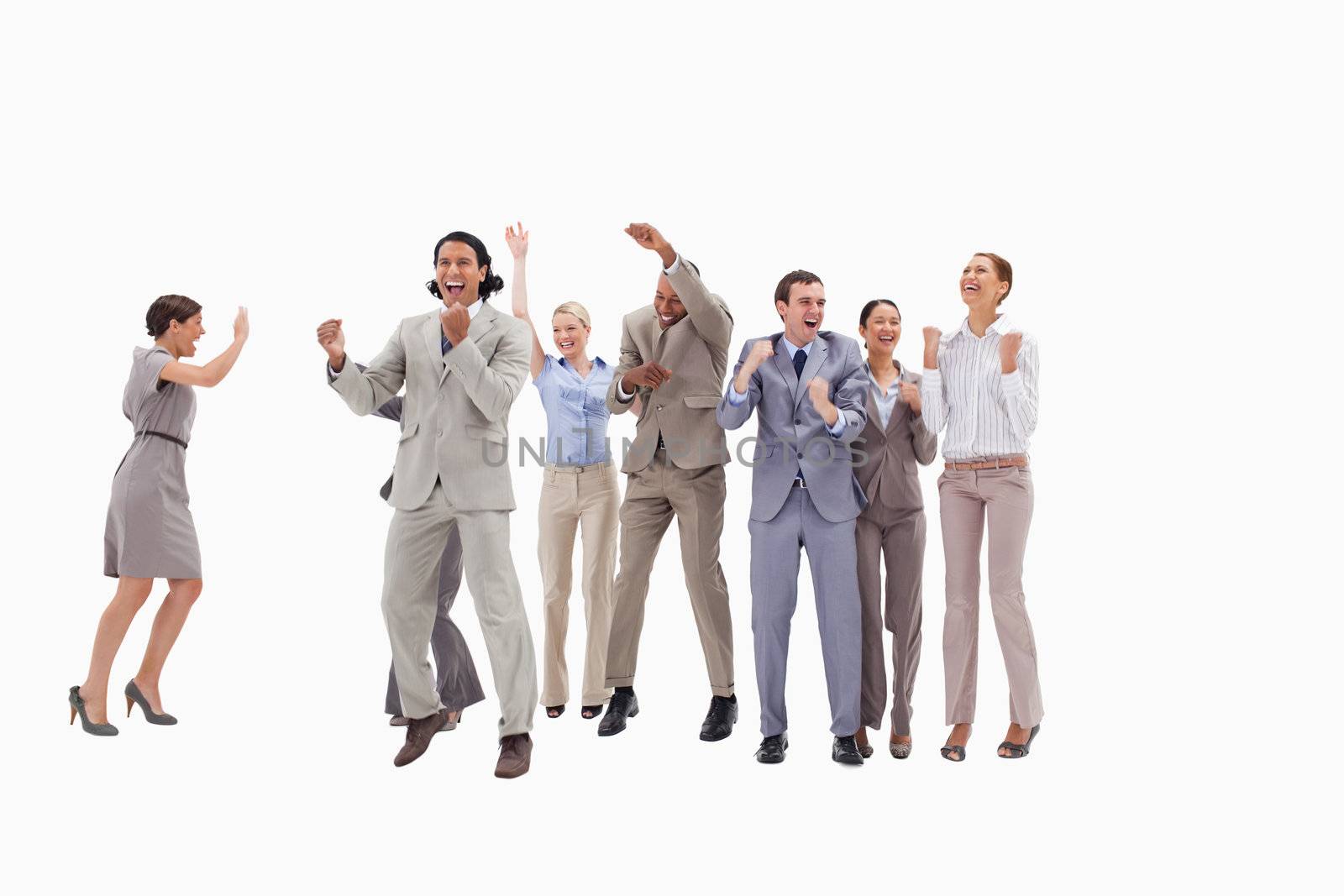 Very happy business people jumping and clenching their fists by Wavebreakmedia