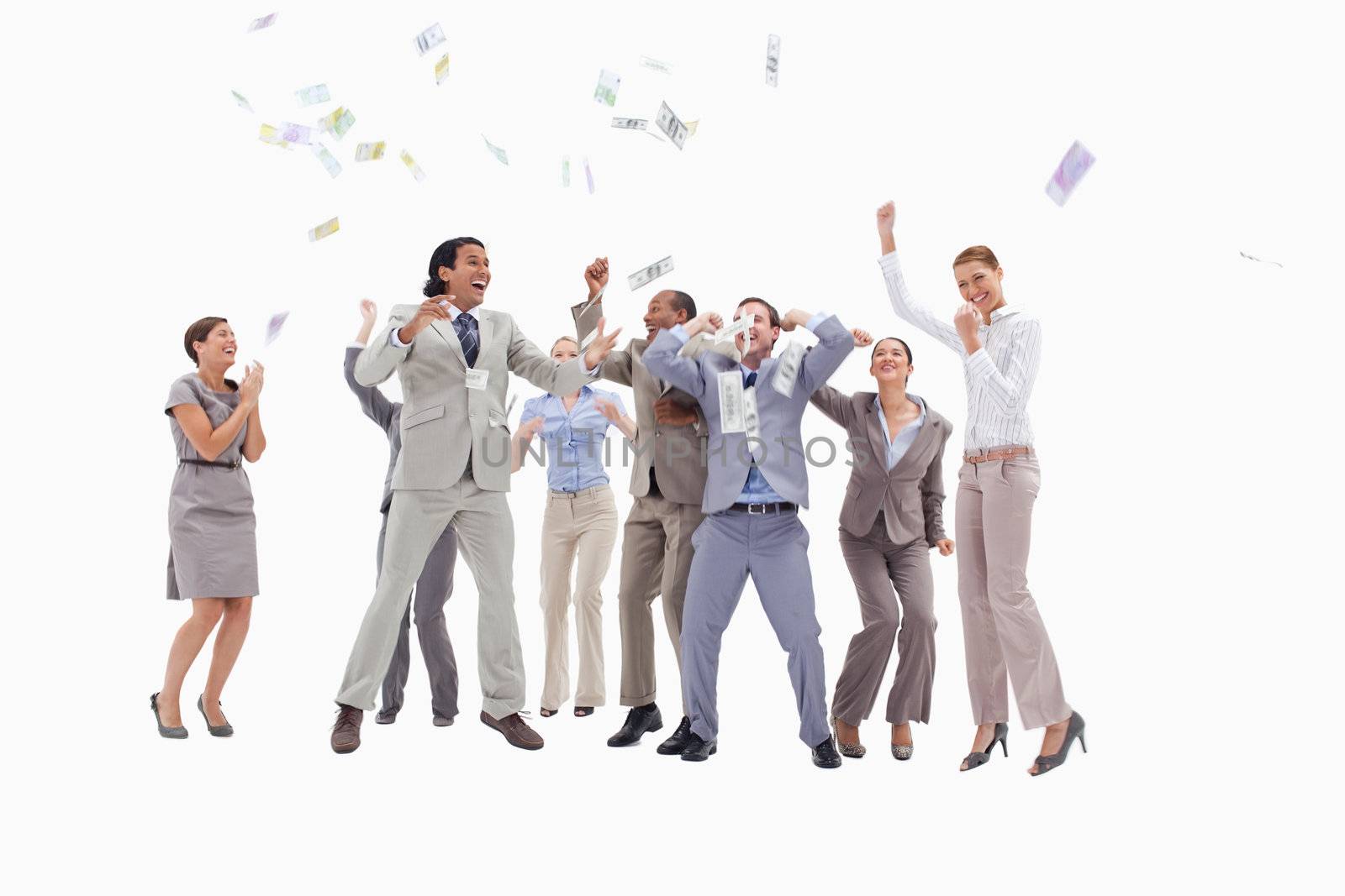 Very enthusiast people jumping and raising their arms with money falling from the sky against white background