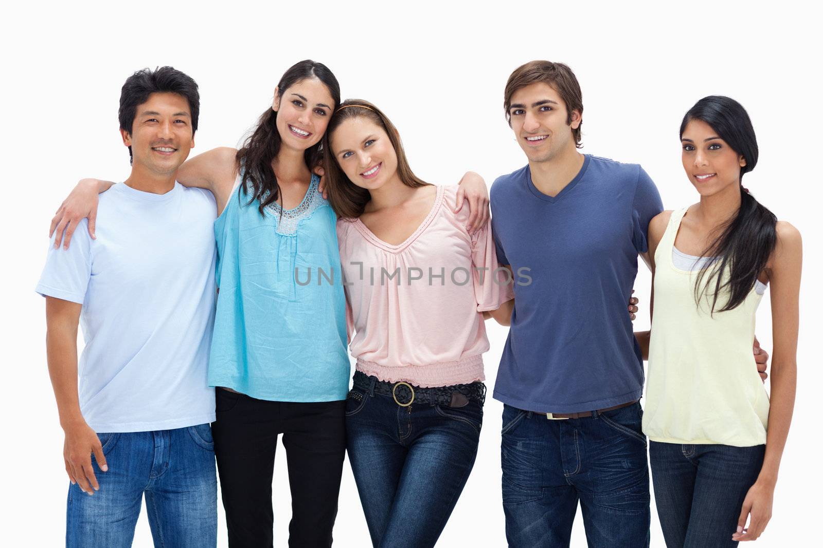 Friends arm in arm against white background