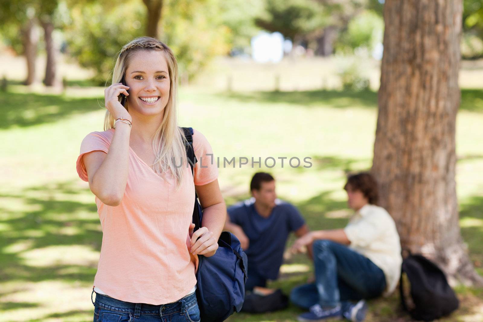 Portrait of a girl on the phone by Wavebreakmedia