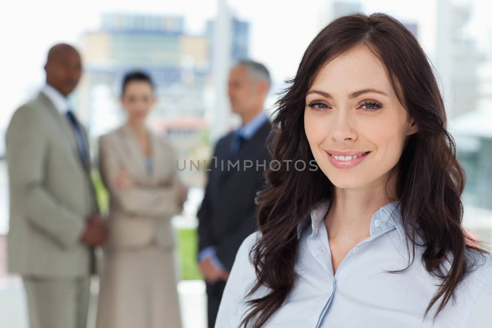 Businesswoman showing a great smile in front of the camera by Wavebreakmedia