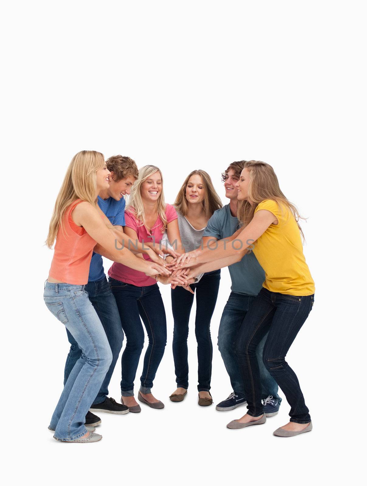 A group of friends smiling and getting ready to cheer