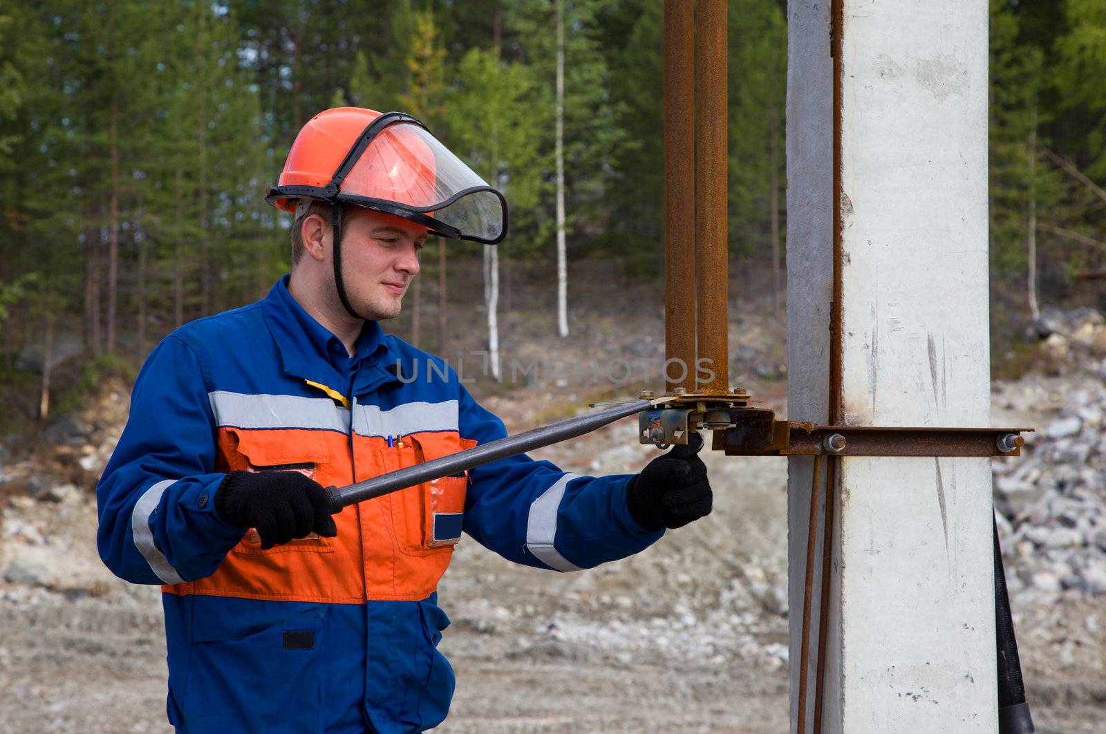 Electric line isolator includes a concrete base for the power line