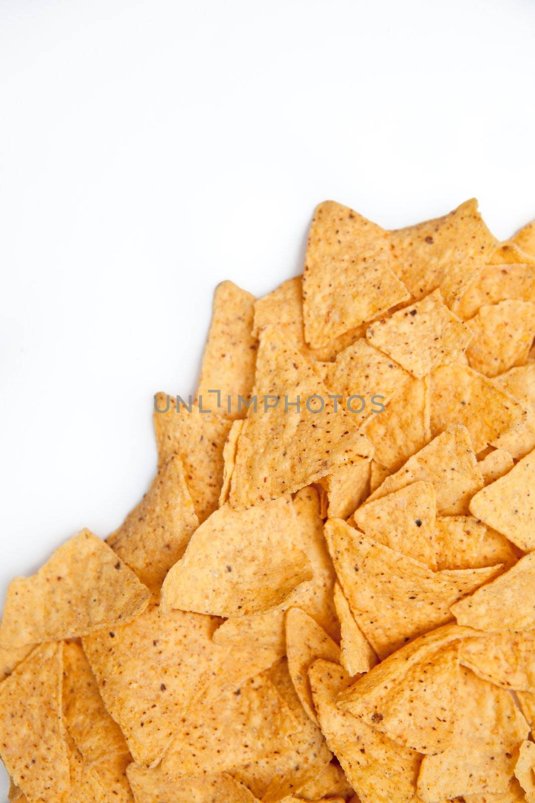 Nachos placed together against a white background