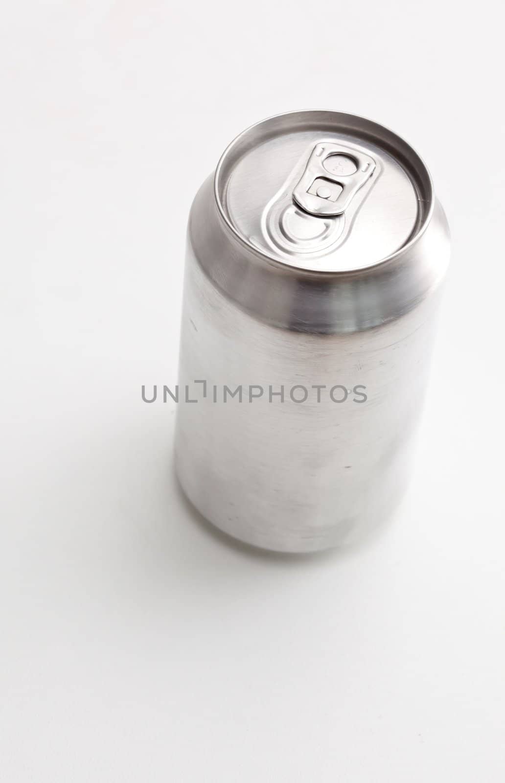 High angle view of a closed can against a white background
