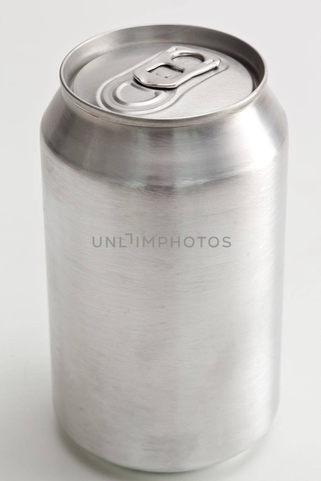 Close up of an aluminium can against a white background 