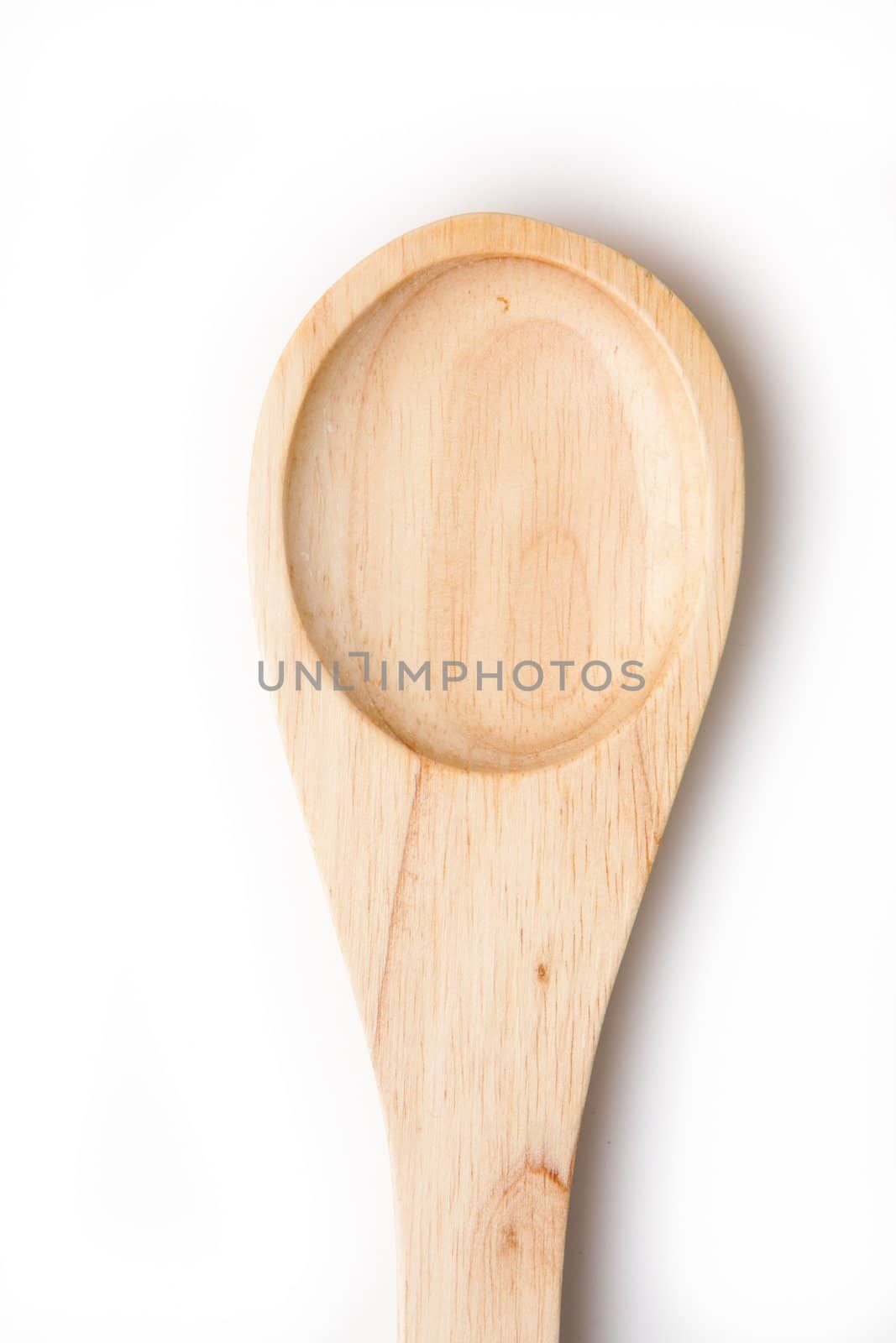 Wooden spoon traditional against a white background