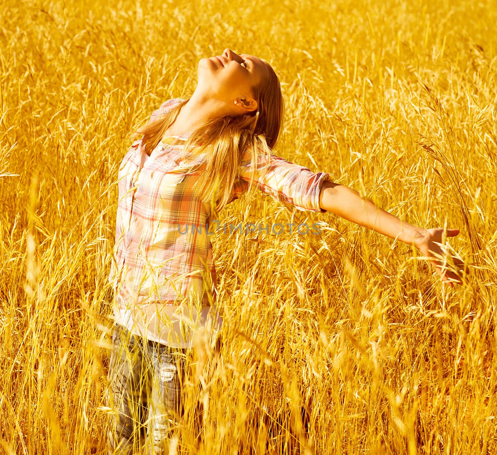 Girl on autumn wheat field by Anna_Omelchenko