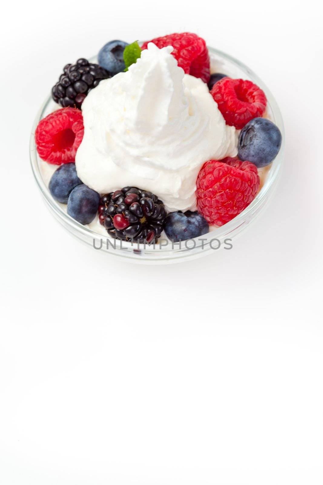 Dessert of berries against a white background