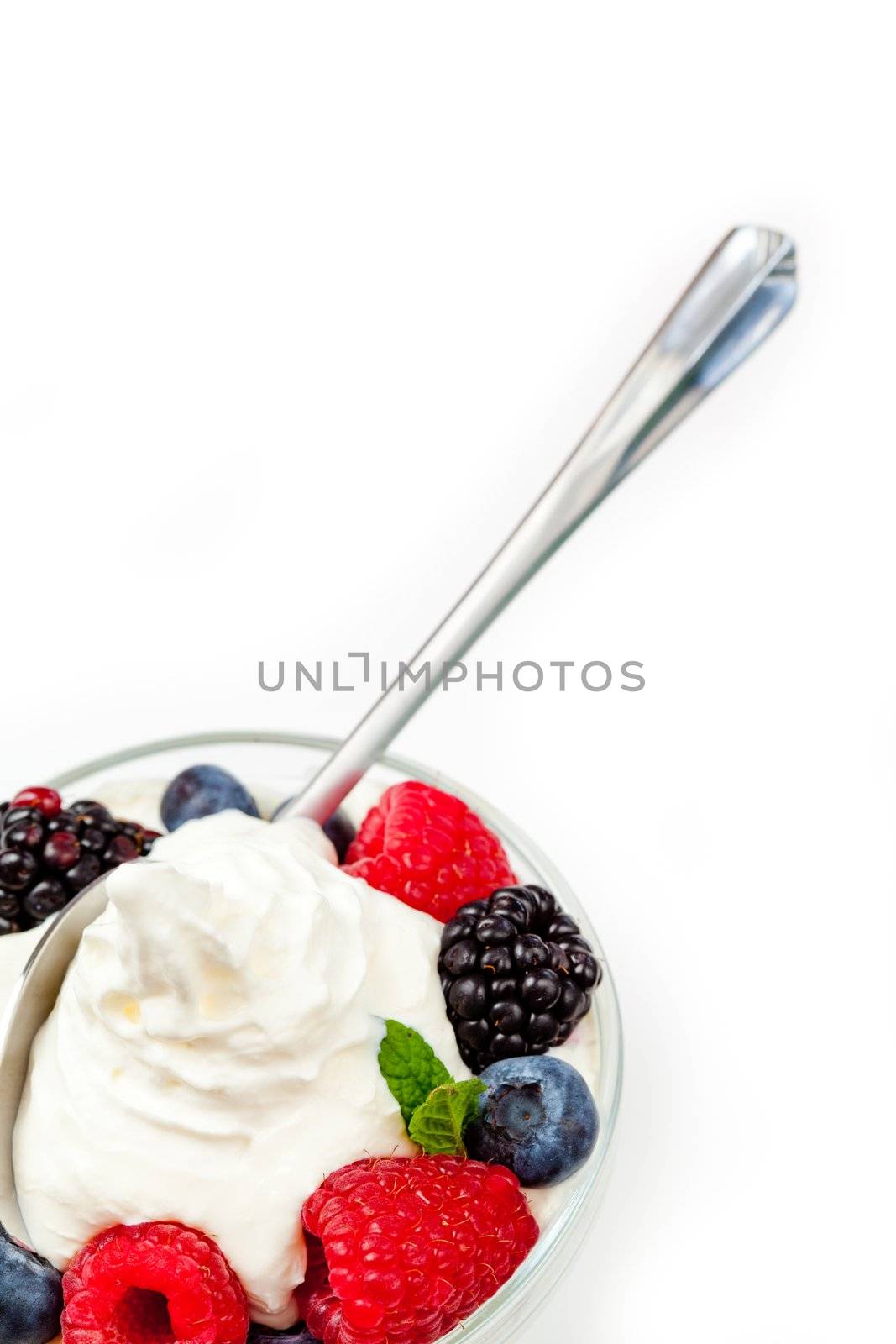 Dessert of berries against a white background