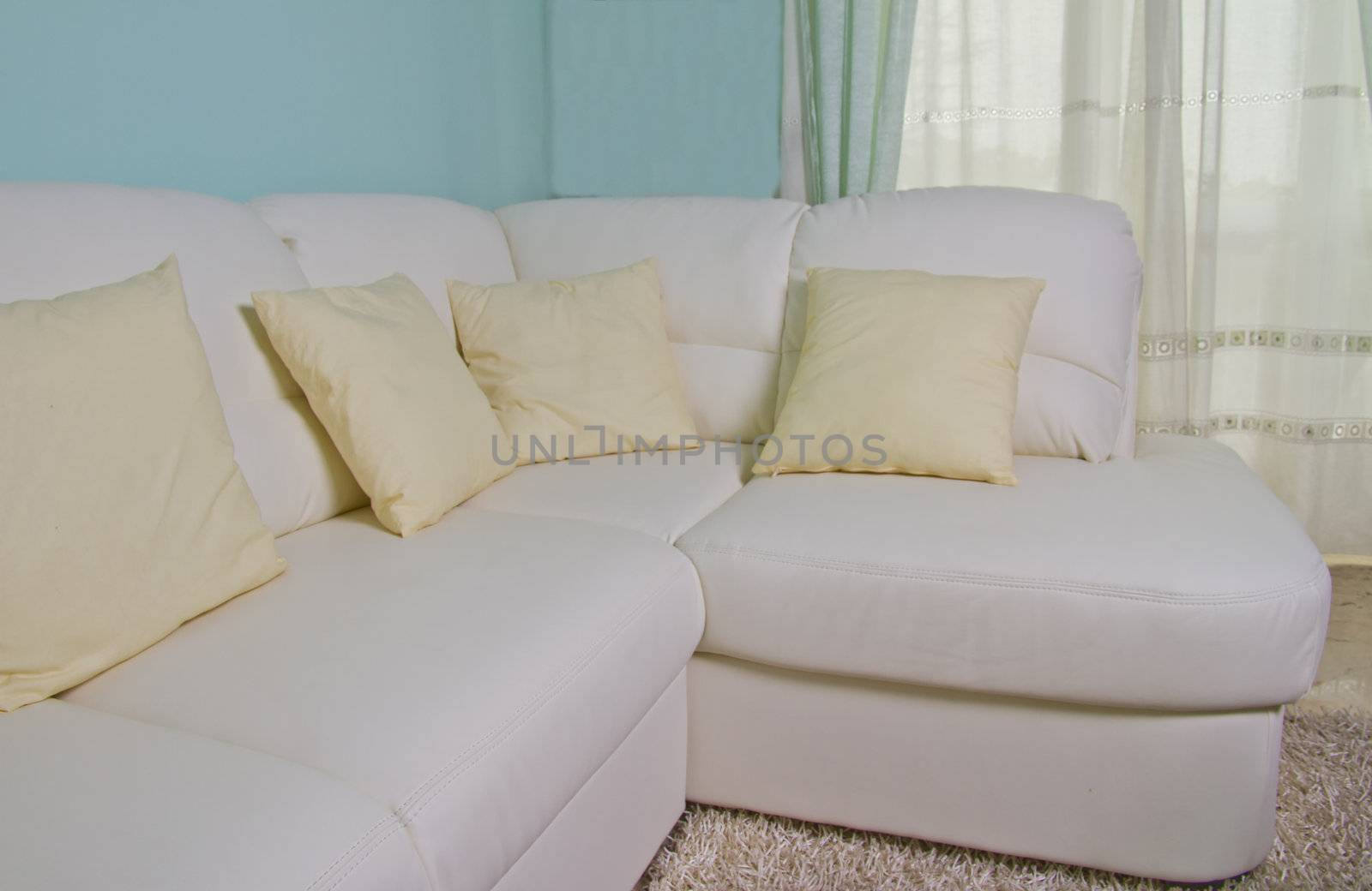 Close up of a white elegant sofa