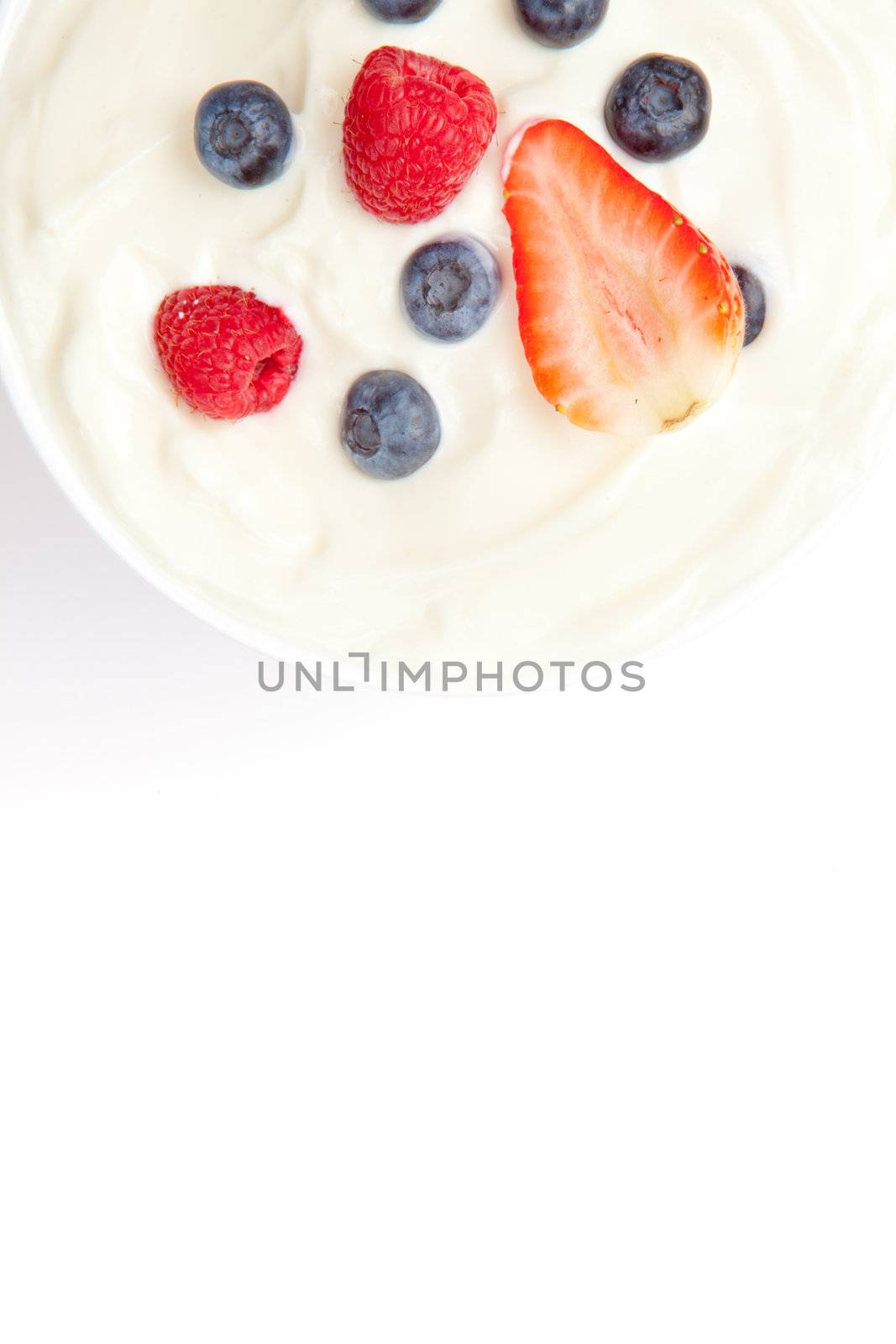 Berries cream against a white background