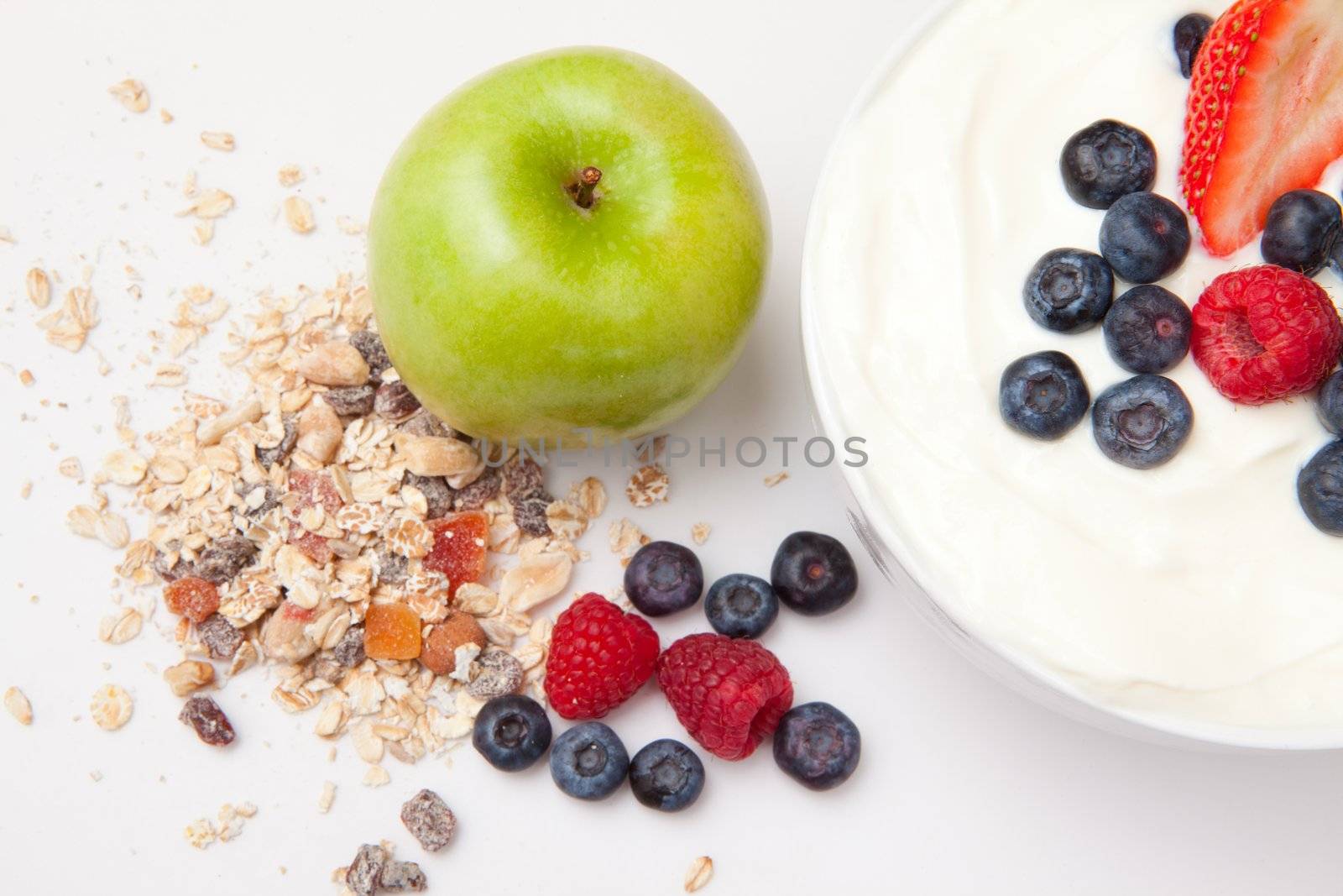 Healthy eating  with fruits against a white background