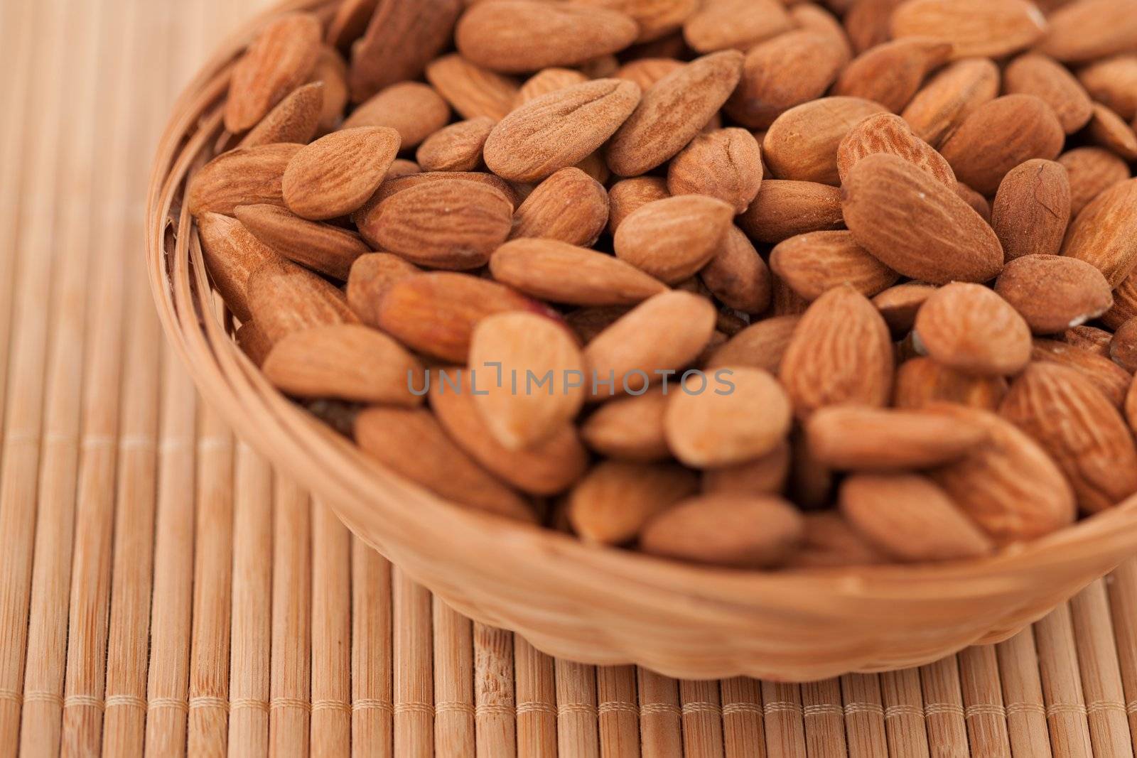 Bowl full of almonds by Wavebreakmedia
