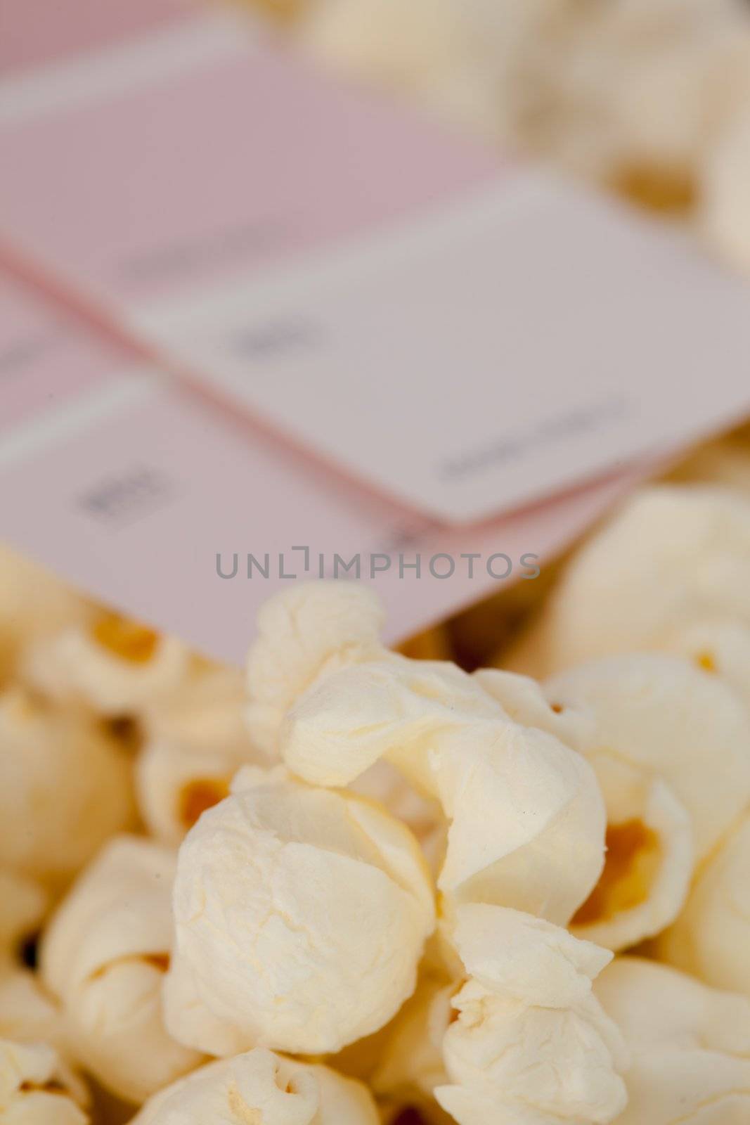 Pop corn and blurred cinema tickets