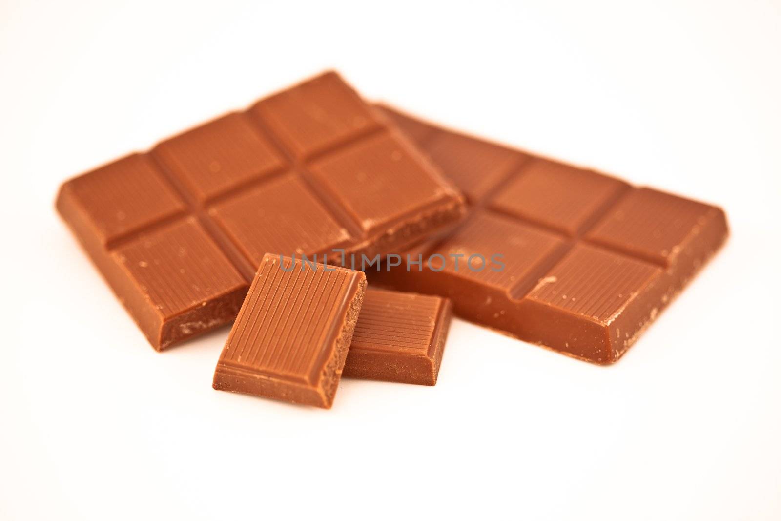 Two bars of chocolate against a white background