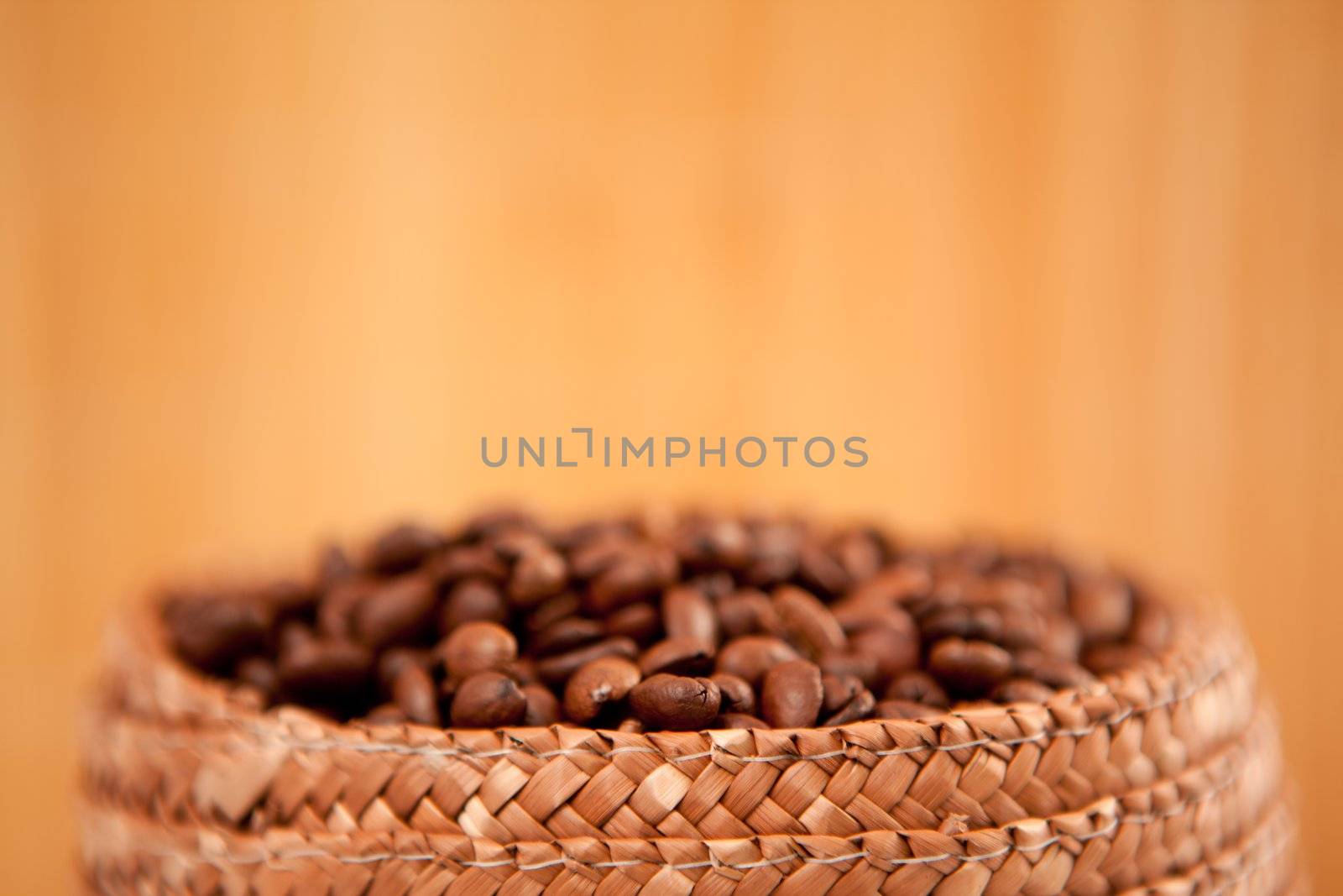 Top of a basket full of coffee seeds by Wavebreakmedia