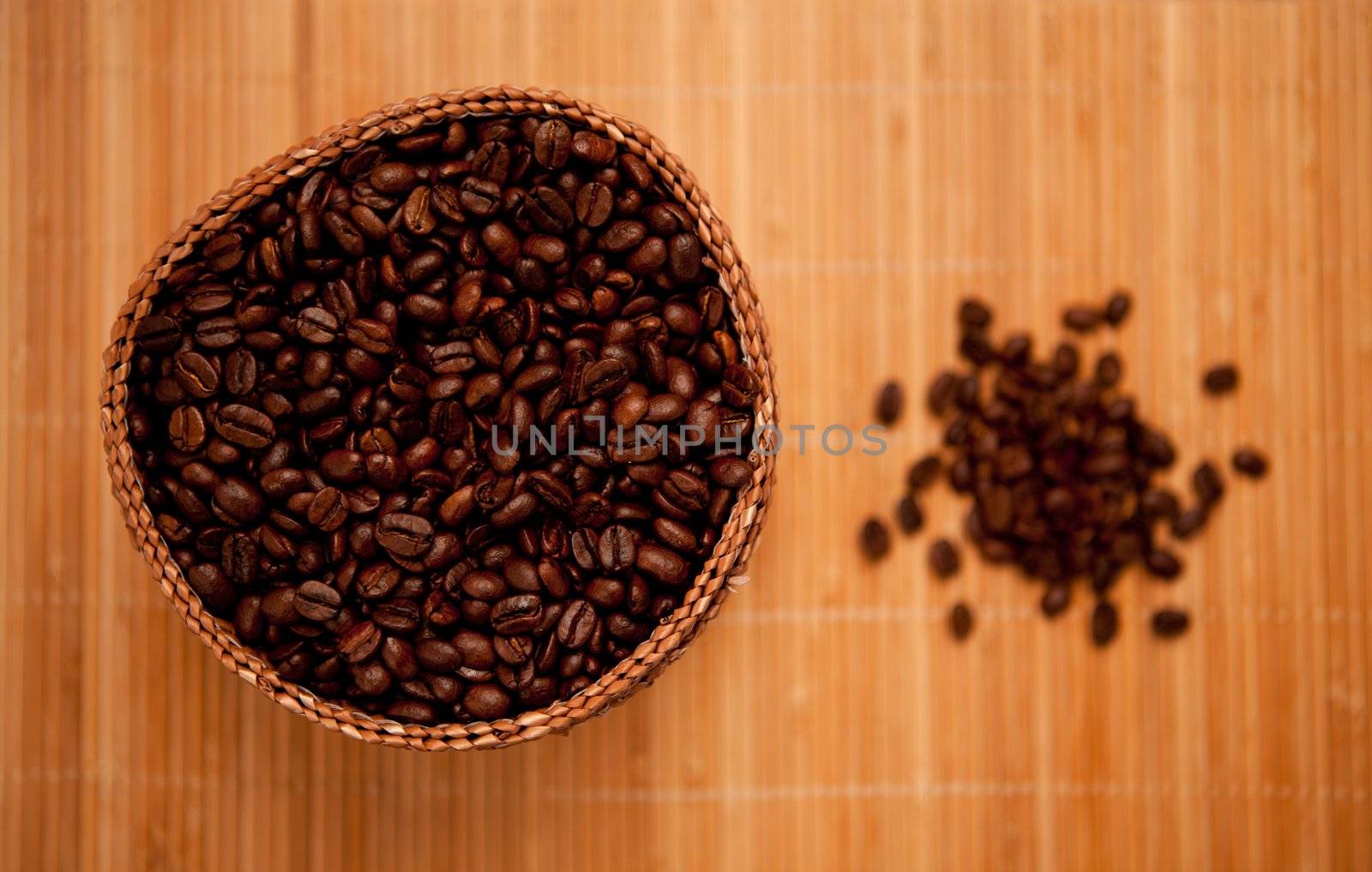 Coffee seeds in a basket by Wavebreakmedia