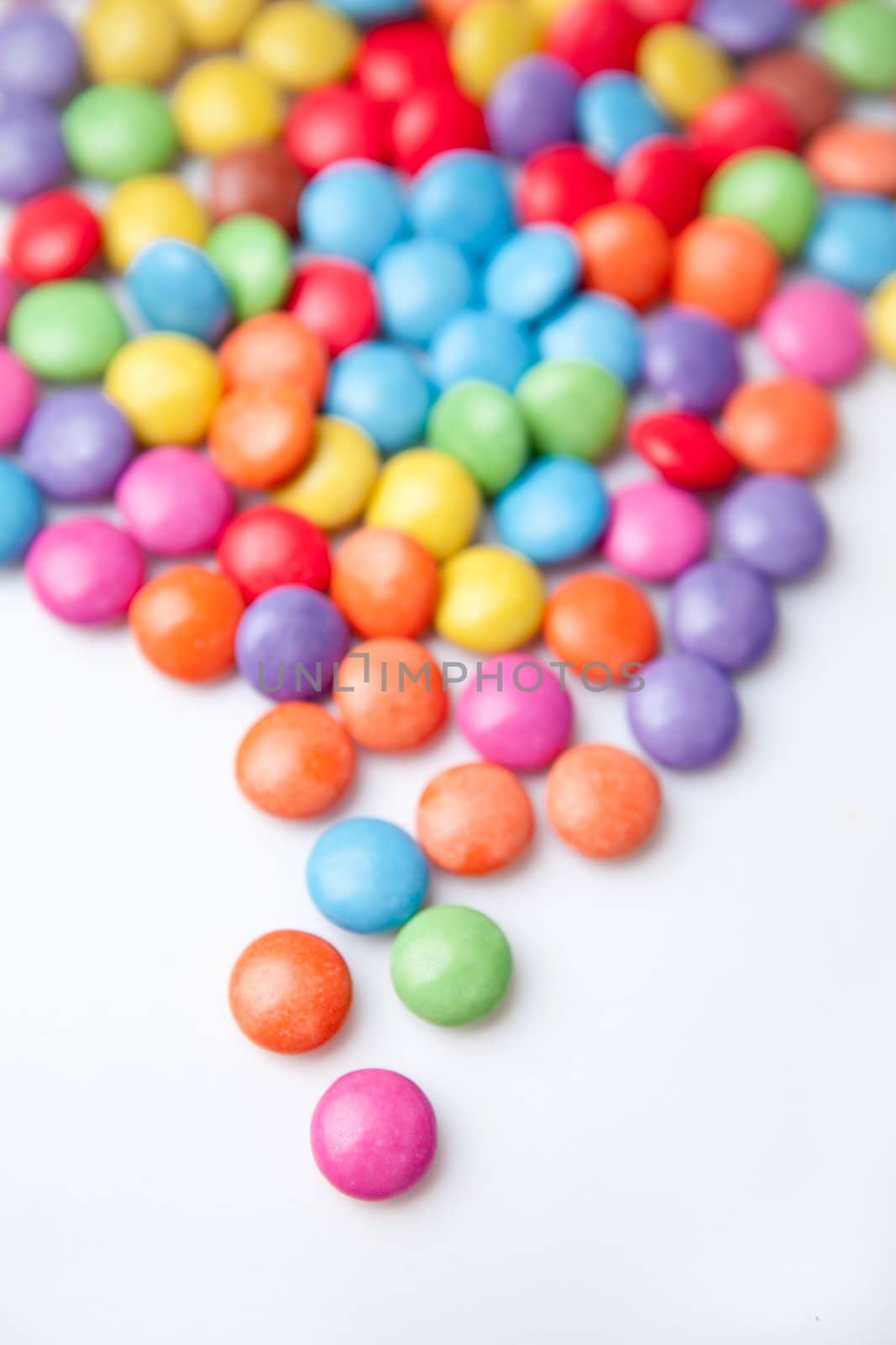 Multicolored chocolate candies by Wavebreakmedia