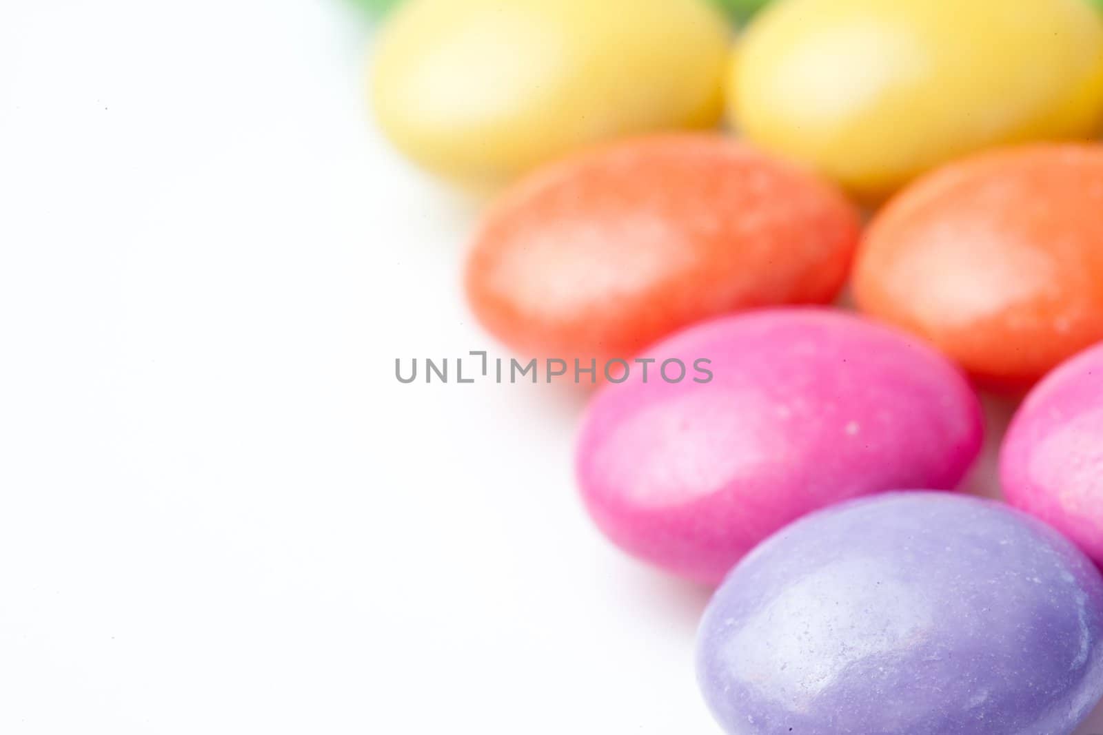 Close-up of chocolate candies against a white background