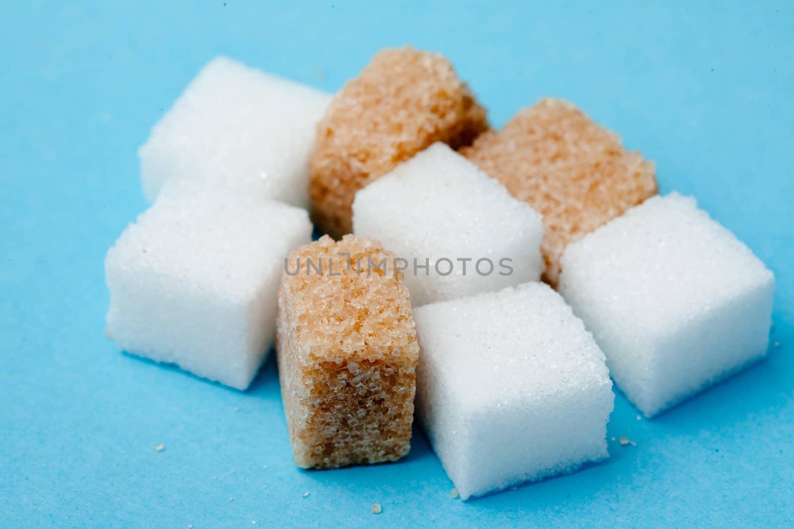 Choice of sugars against a blue background