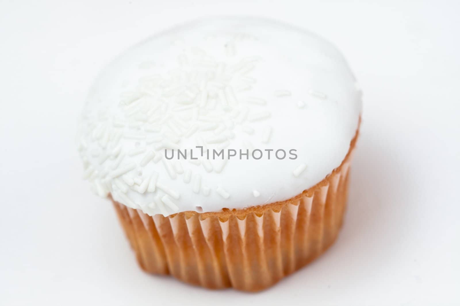 White cupcake against a white background