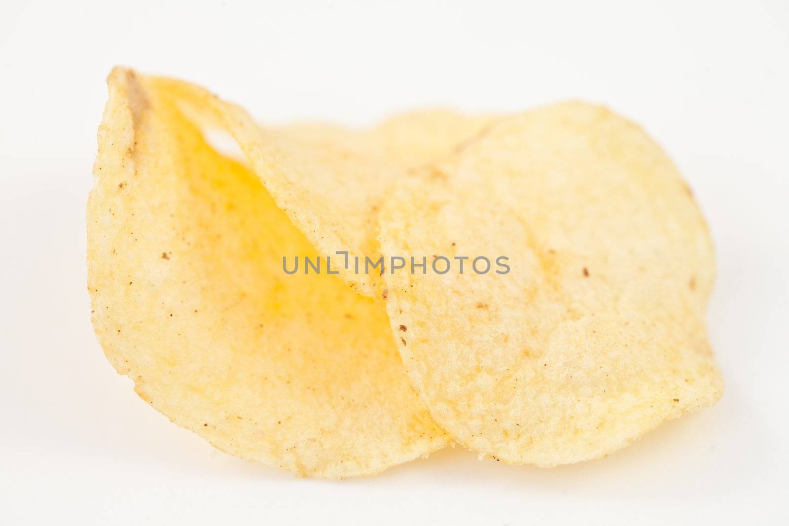 Three crisps against white background