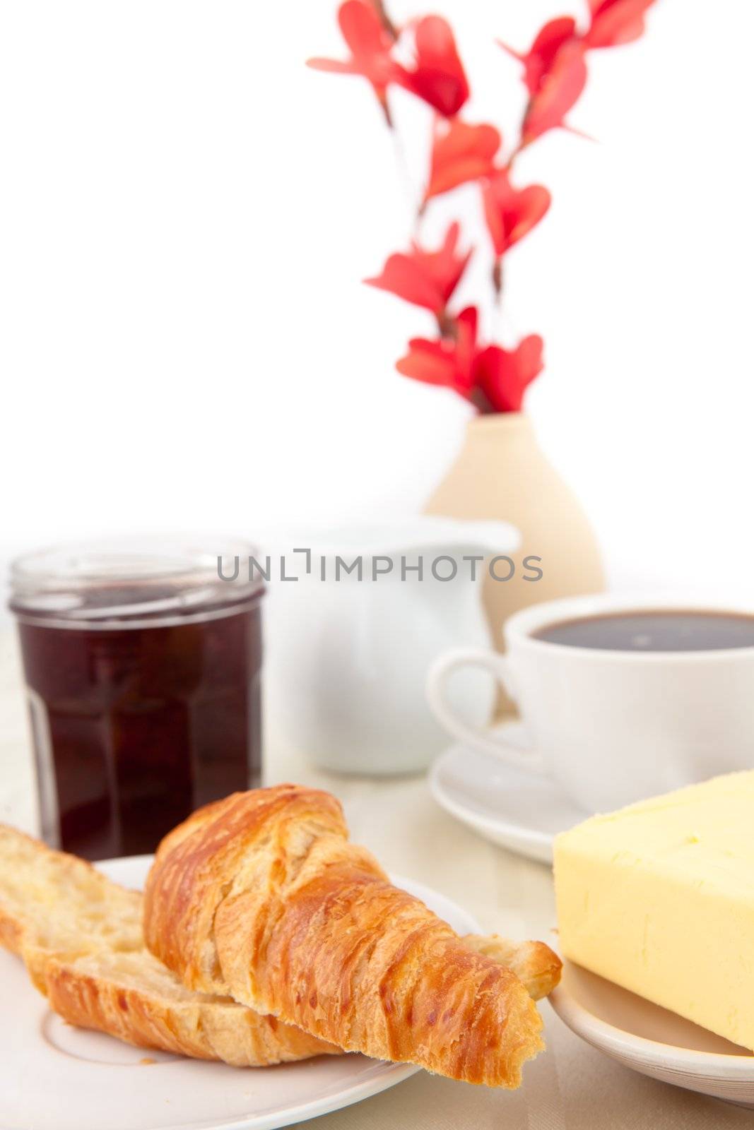 Table presentation for a breakfast against white background