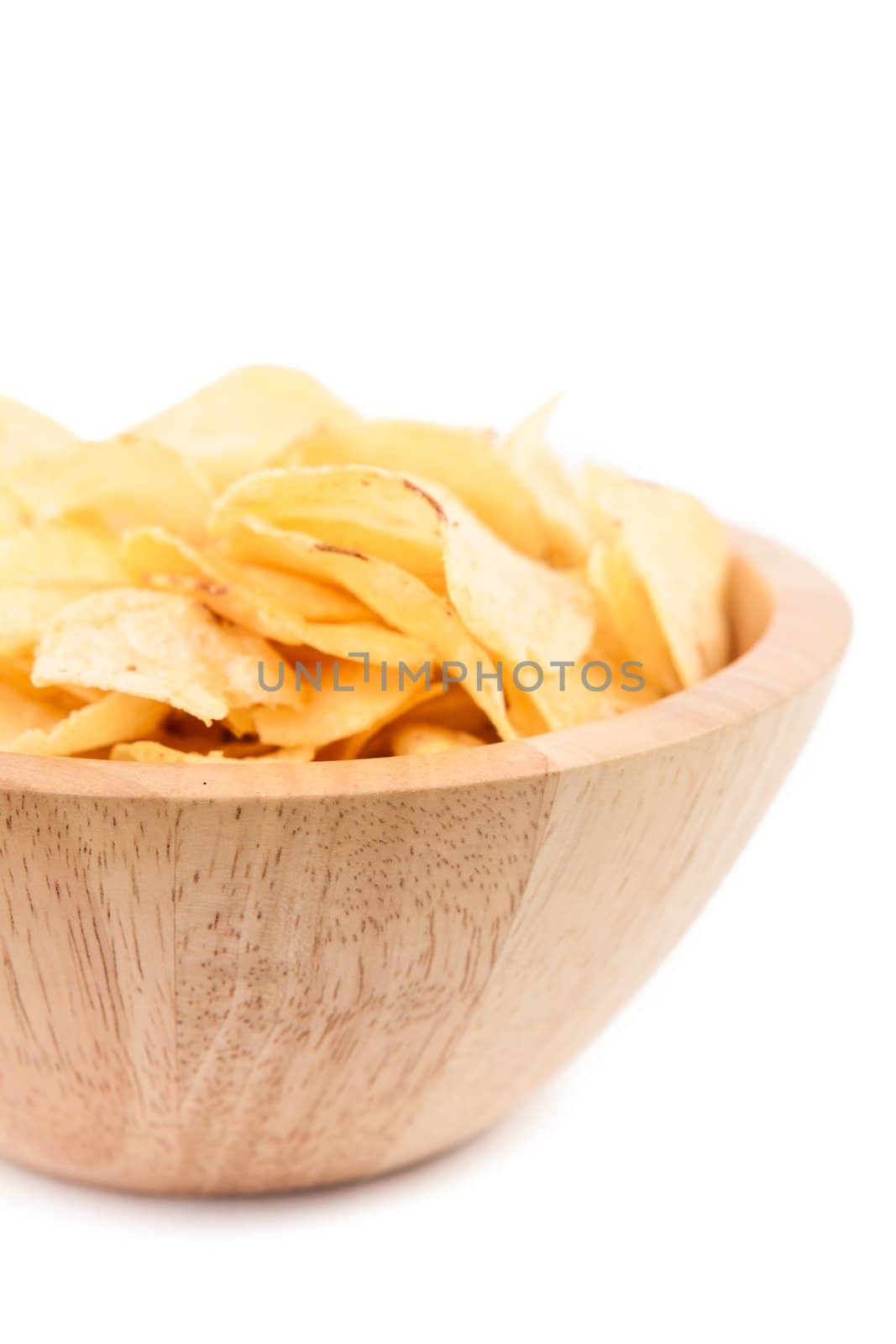 Crisps in a bowl  against white background 