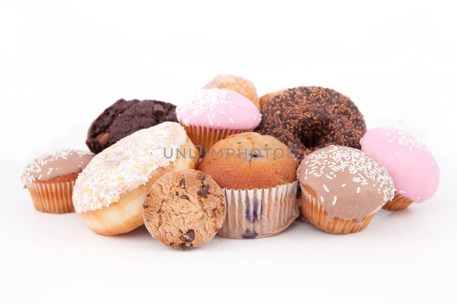 Cakes laid out together against a white background