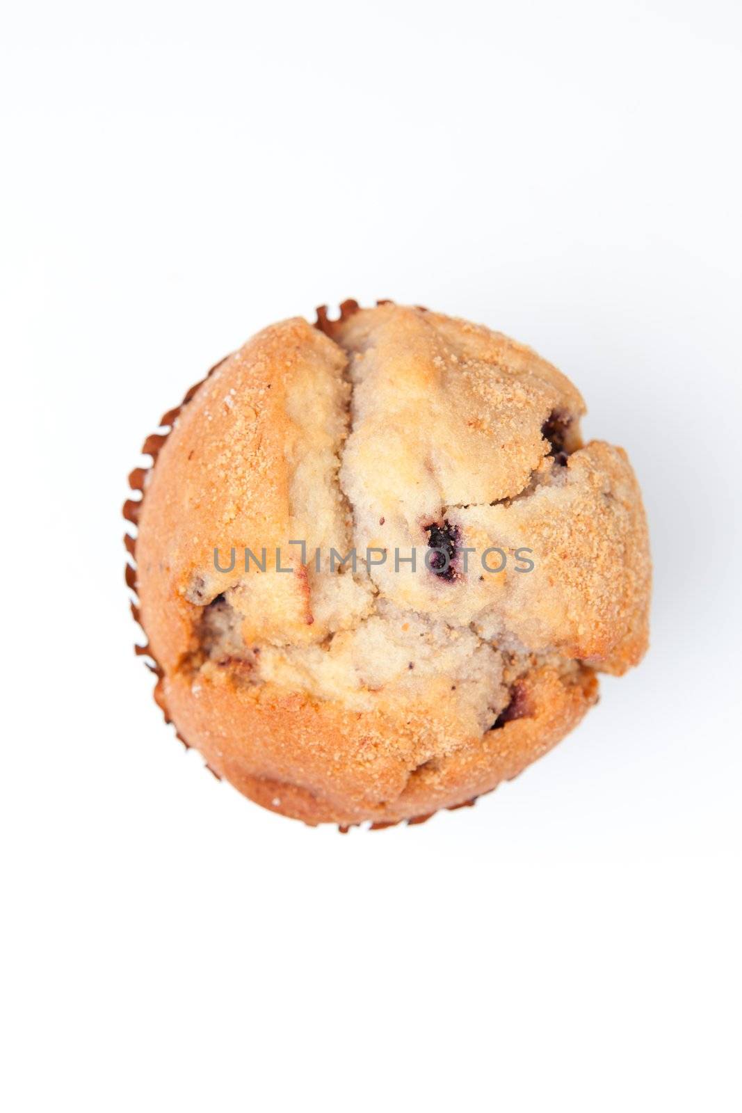 Extreme close up of a muffin against a white background