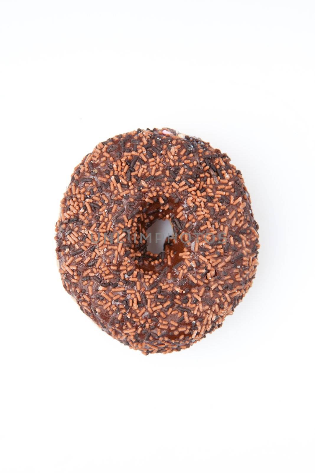 Close up of a chocolate doughnut  by Wavebreakmedia