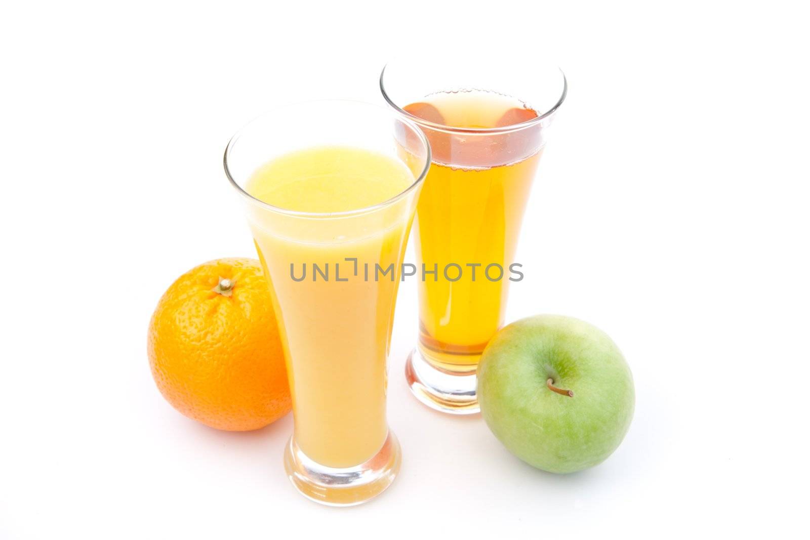 Glass of apple juice near a glass of orange juice against white background