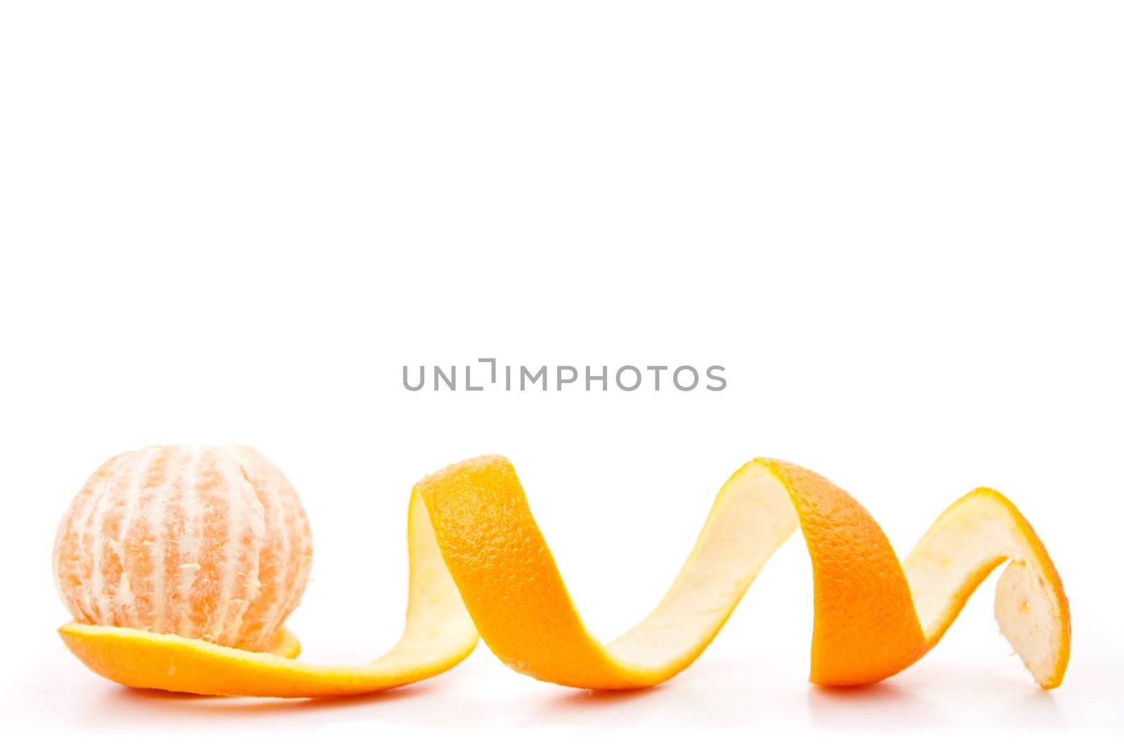 Orange posed on a orange peel against white background