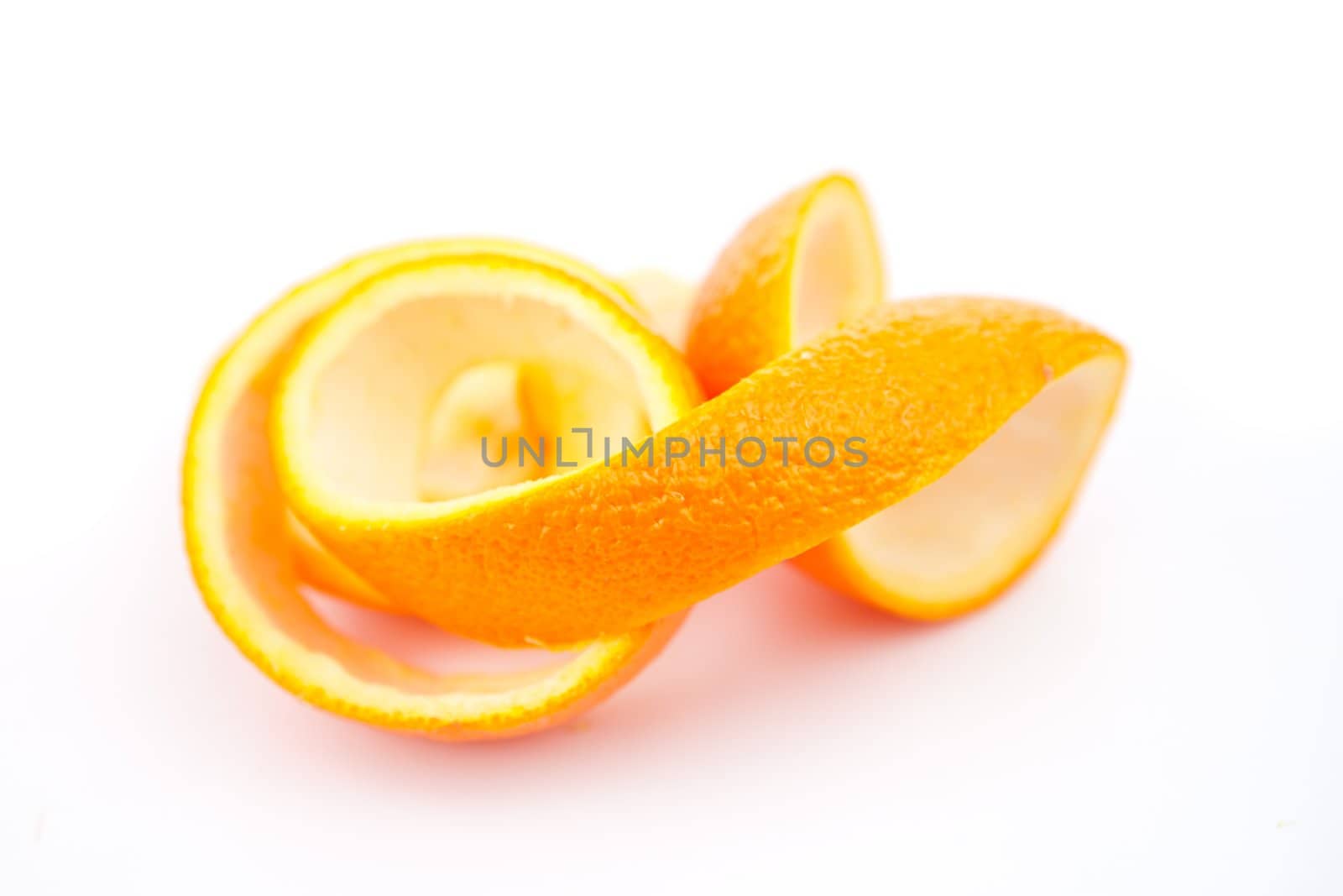 Orange rind against white background