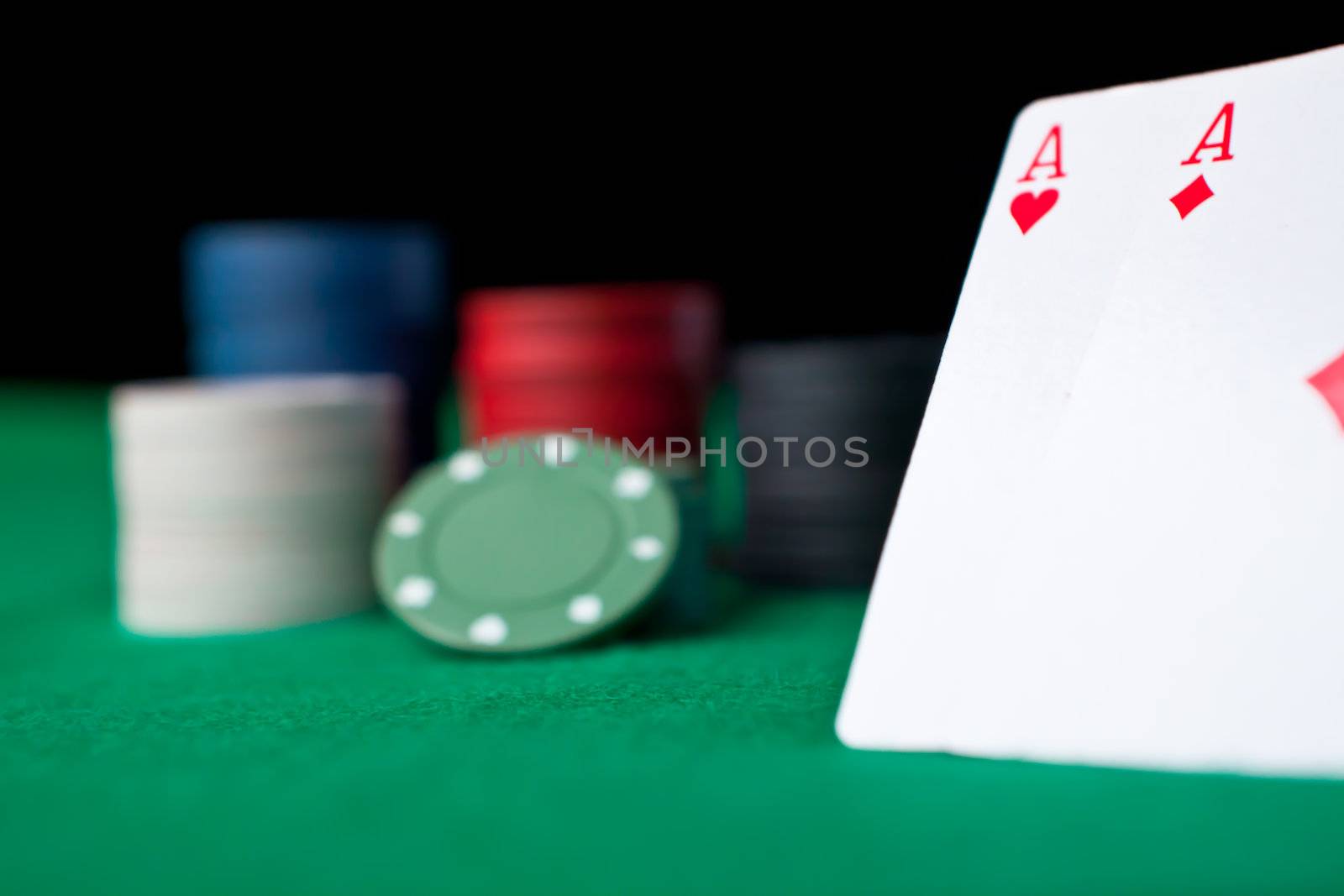 Party of poker against a black background