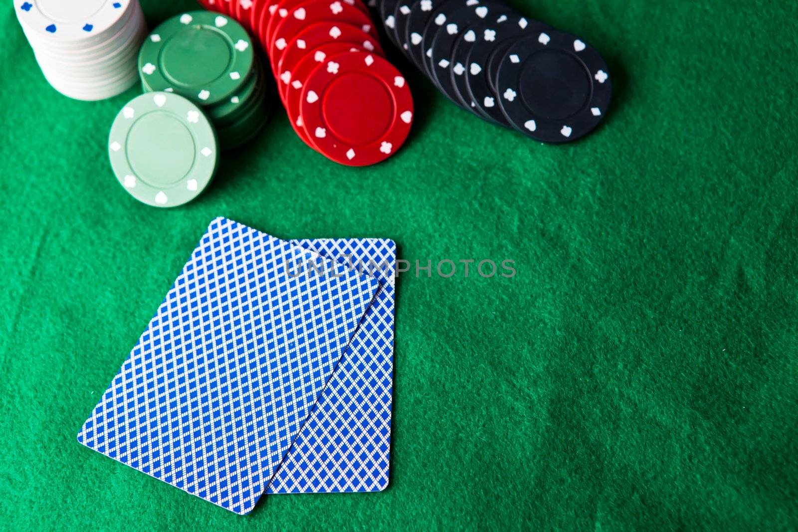 Cards and chips on the green mat