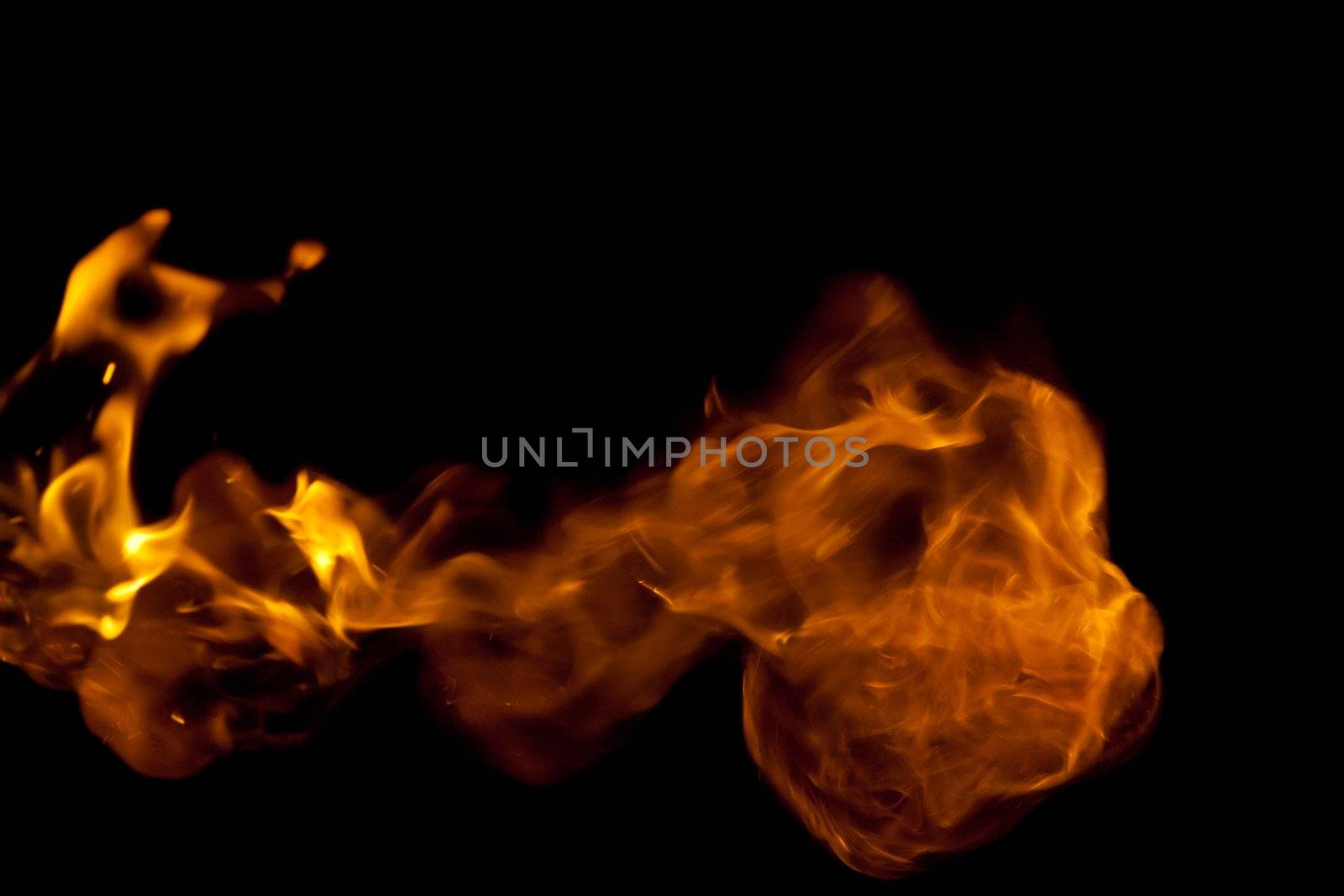 Fire flame against a black background