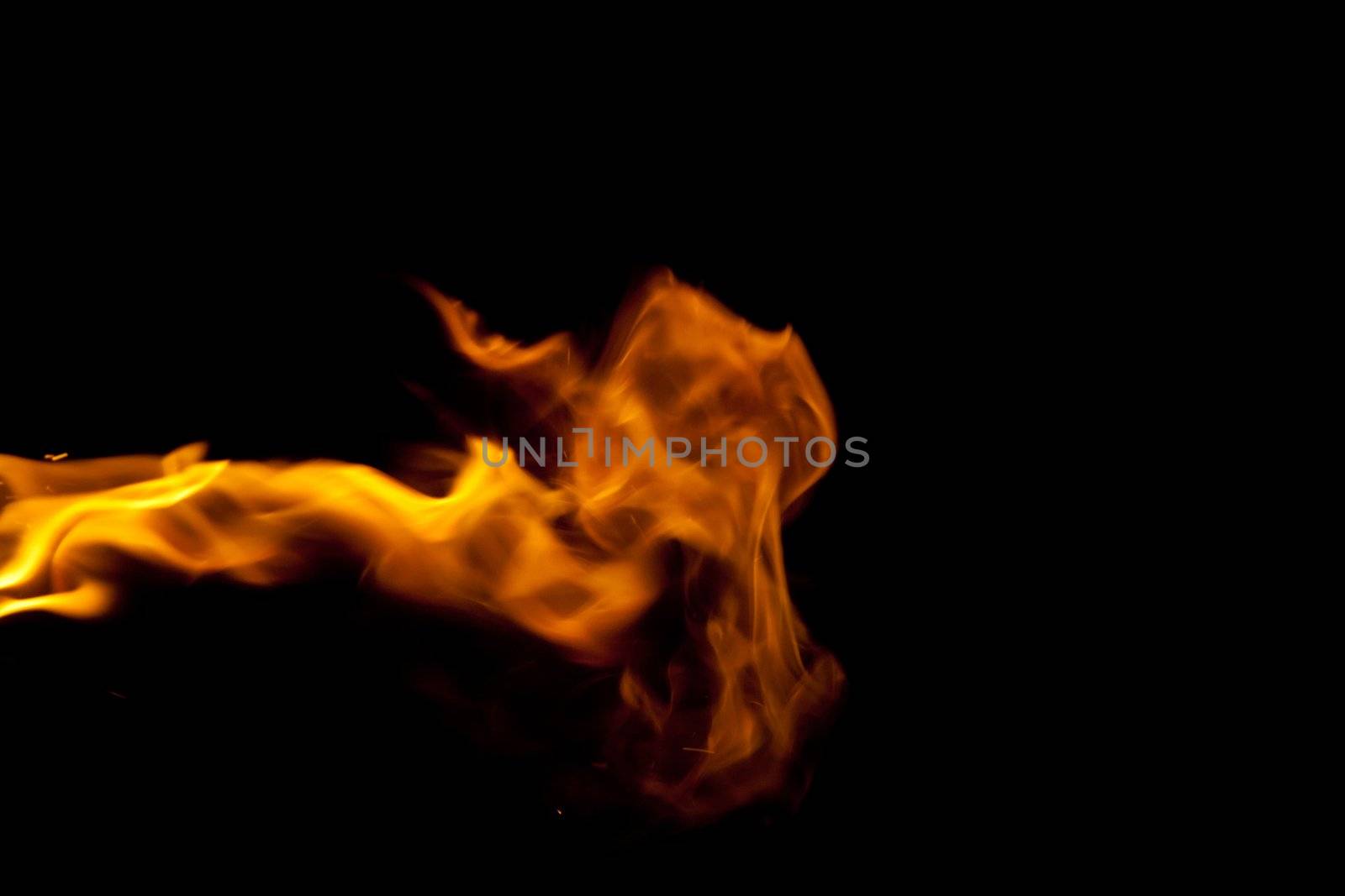 Flame of fire against a black background